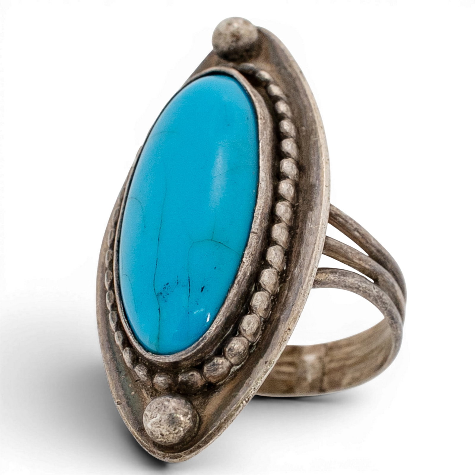 Vintage Navajo Sterling Silver & Turquoise Navette Ring Signed: Vintage Navajo Sterling Silver & Turquoise Navette Ring Signed 1970s-1980s, USA Elongated navette-form ring set with a polished oval turquoise cabochon in a serrated bezel, framed by applied beadwork 
