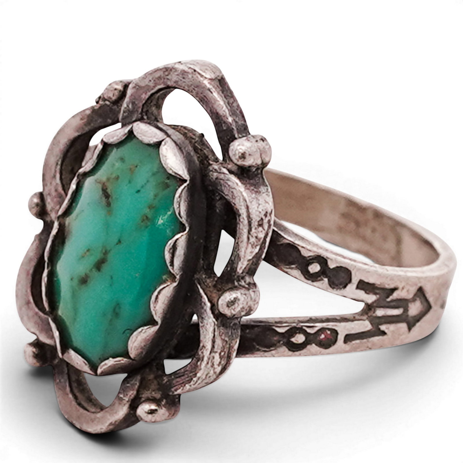 Vintage Navajo Sterling Silver & Turquoise Ring: Vintage Navajo Sterling Silver & Turquoise Ring 1960s-1970s, USA Vintage Navajo sterling silver ring set with an elongated oval turquoise cabochon of light green-blue coloration with natural matrix, m