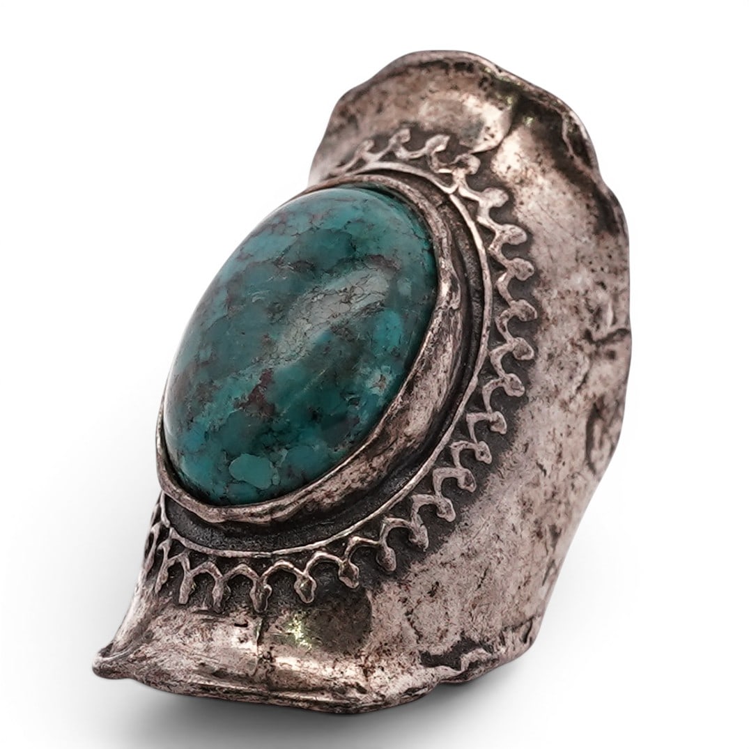 Vintage Israeli Sterling Silver & Turquoise Ring Signed: Vintage Israeli Sterling Silver & Turquoise Ring Signed 1970s–1980s, Israel Sterling silver ring set with a large oval turquoise cabochon exhibiting natural matrix within a smooth bezel, surrounded 