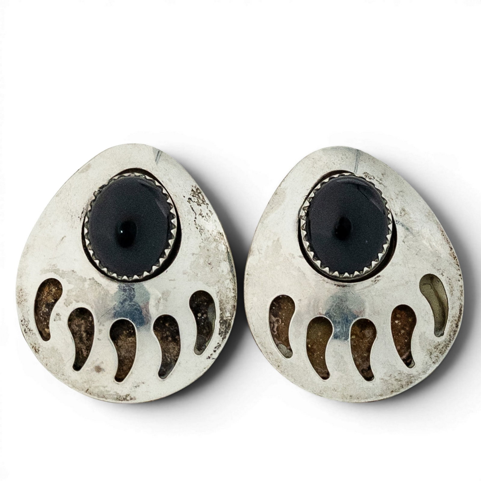 Vintage Navajo Sterling Silver & Onyx Bear Paw Earrings: Vintage Navajo Sterling Silver & Onyx Bear Paw Earrings 1970s–1980s, USA Pair of Navajo sterling silver bear paw-form earrings each set with an oval black onyx cabochon measuring approximately 10 ×