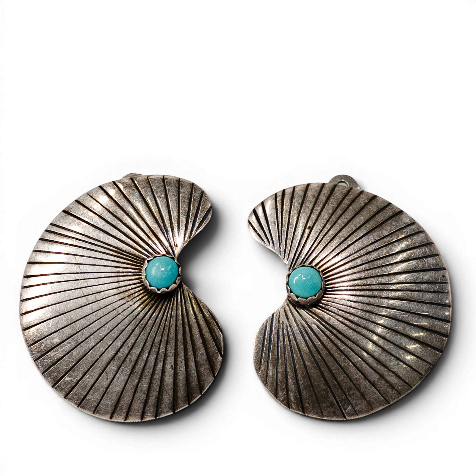 Vintage Southwestern Sterling Silver & Turquoise Fan Earrings: Vintage Southwestern Sterling Silver & Turquoise Fan Earrings 1970s–1980s, USA Pair of Southwestern sterling silver earrings of fan-form construction with radiating hand-stamped linework centered by