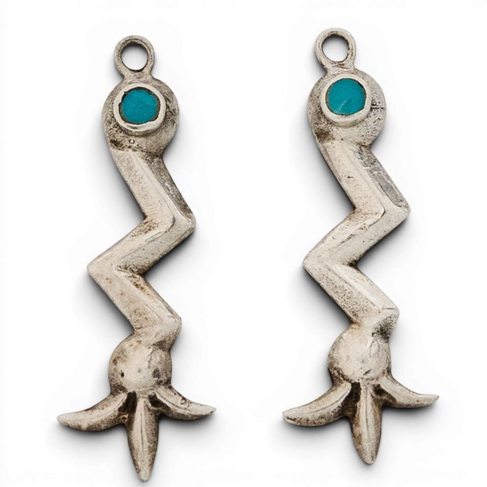Navajo Sterling Silver & Turquoise Squash Blossom Earrings Signed: Navajo Sterling Silver & Turquoise Squash Blossom Earrings Signed Late 20th century, USA Pair of Navajo sterling silver dangle earrings set with round turquoise cabochons in plain bezels above angular