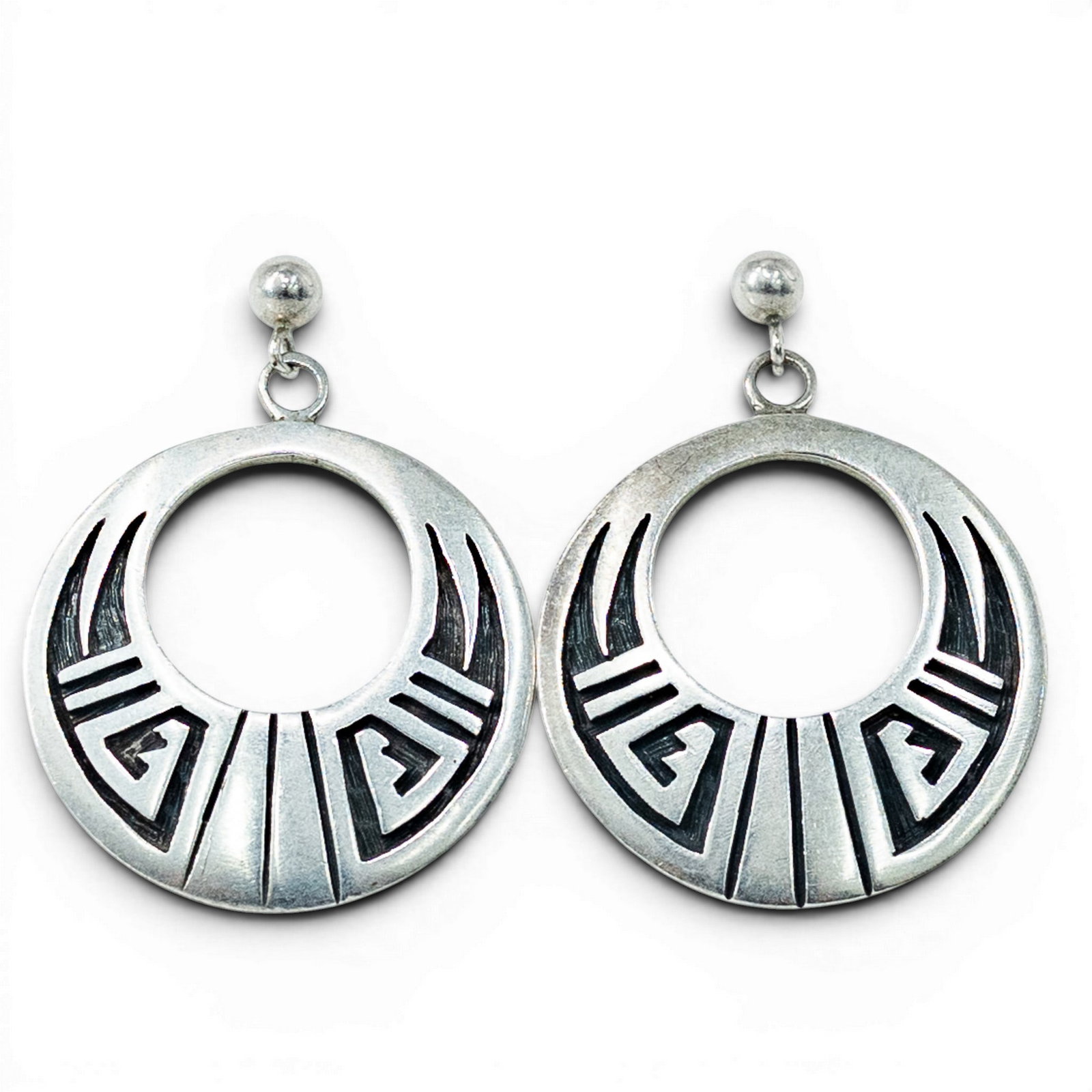 Southwestern Sterling Silver Overlay Earrings Signed: Southwestern Sterling Silver Overlay Earrings Signed 1980s–1990s, USA Pair of Southwestern sterling silver openwork drop earrings with geometric overlay decoration and oxidized recessed detailing. H
