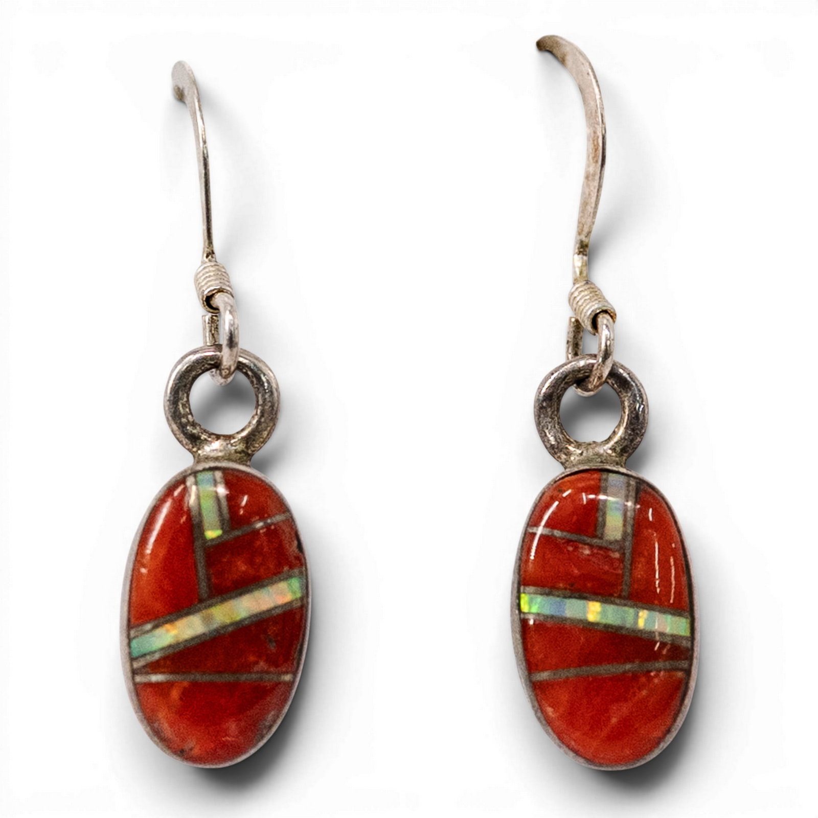 Southwestern Sterling Silver Red Spiny & Oyster Inlay Earrings Signed: Southwestern Sterling Silver Red Spiny & Oyster Inlay Earrings Signed 1980s–1990s, USA Pair of Southwestern sterling silver oval drop earrings set with red spiny oyster shell inlay accented by diago