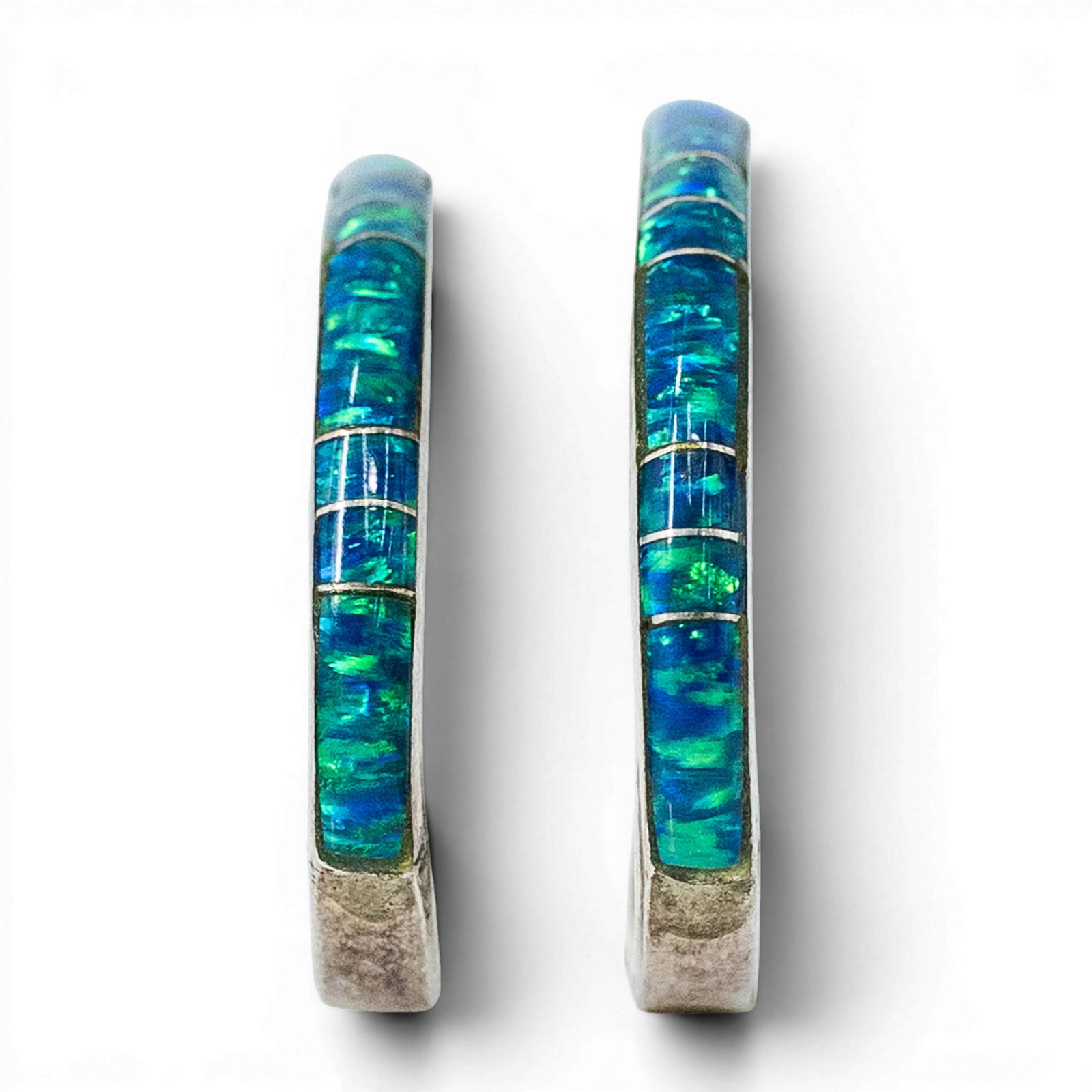 Vintage Navajo Sterling Silver & Opal Inlay Signed: Vintage Navajo Sterling Silver & Opal Inlay Signed 1970s-1990s, USA Pair of vintage Navajo sterling silver half hoop earrings with blue and green channel inlaid lab opal decoration. Reverse stamped ��