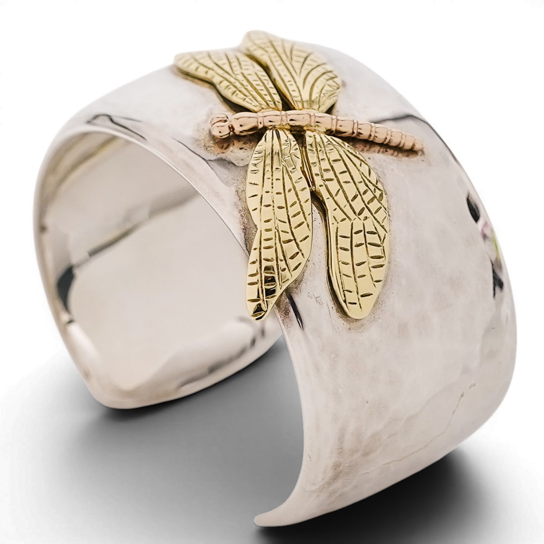 Tiffany & Co. Sterling Silver & 18K Gold Dragonfly Cuff Bracelet: Tiffany & Co. Sterling Silver & 18K Gold Dragonfly Cuff Bracelet 2001, USA Hammered sterling silver cuff bracelet with applied dragonfly motif in 18K yellow and rose gold. Signed "TIFFANY & CO", dated