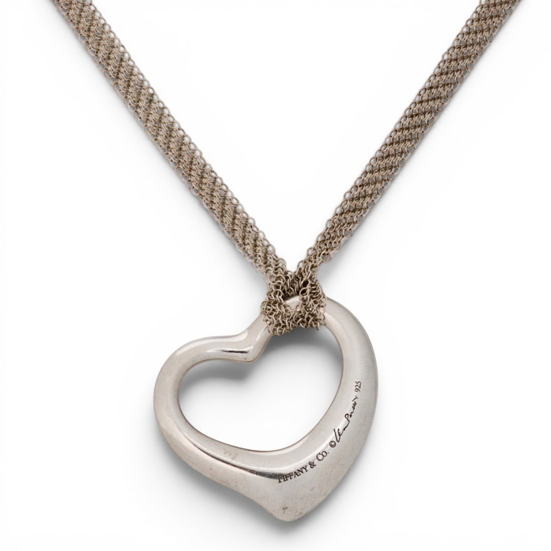 Tiffany & Co. Elsa Peretti Sterling Silver Open Heart Pendant Necklace: Tiffany & Co. Elsa Peretti Sterling Silver Open Heart Pendant Necklace 1980s–1990s, USA Sterling silver open heart pendant necklace designed by Elsa Peretti for Tiffany & Co. Classic asymmetrical Op