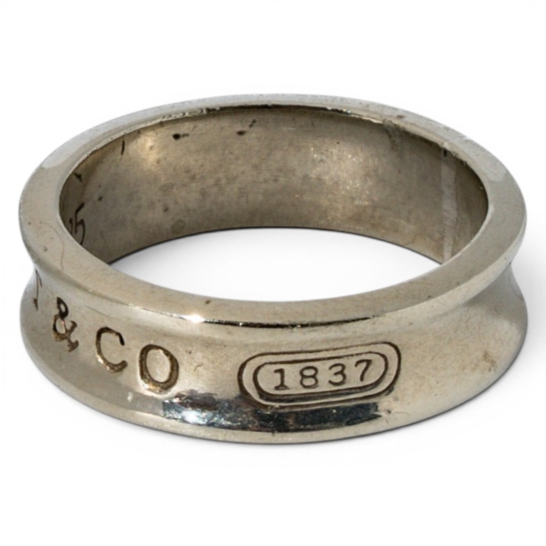 Tiffany & Co. Sterling Silver 1837 Narrow Ring: Tiffany & Co. Sterling Silver 1837 Narrow Ring 1997, USA Classic Tiffany & Co. 1837 sterling silver band ring featuring raised exterior "T & Co." lettering and recessed "1837" cartouche motif, commemo