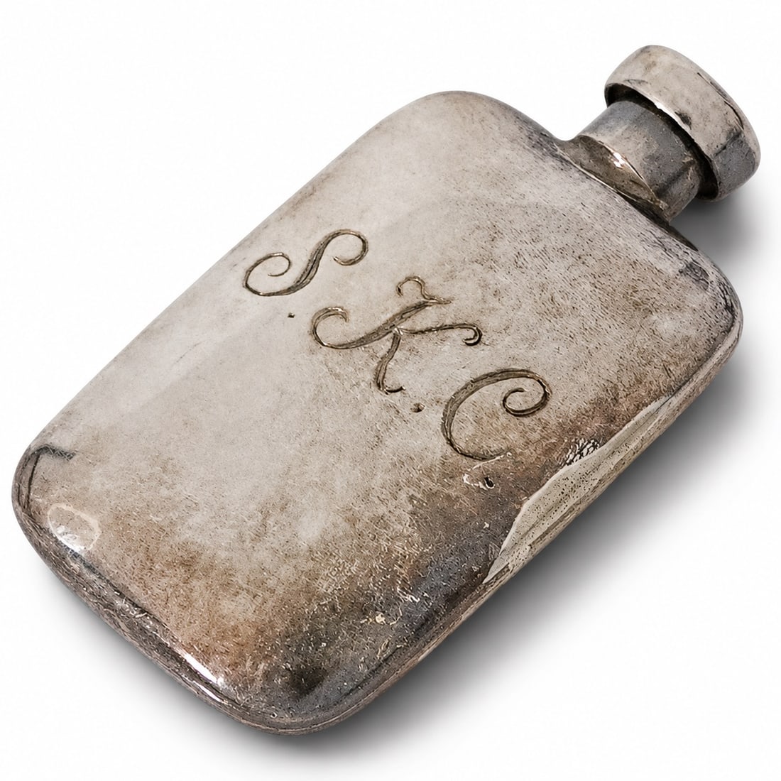 Antique Tiffany & Co. Sterling Silver Miniature Perfume Bottle: Antique Sterling Silver Miniature Perfume Bottle Early 20th Century, USA Miniature sterling silver perfume bottle of rounded rectangular form with threaded screw cap and dipper applicator. Front engra