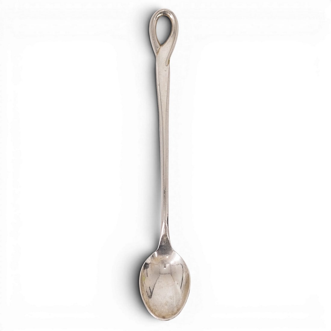 Tiffany & Co. Elsa Peretti Sterling Silver Spoon: Tiffany & Co. Elsa Peretti Sterling Silver Spoon 1994, Italian Sterling silver spoon designed by Elsa Peretti for Tiffany & Co., featuring an elongated handle terminating in a looped finial and oval b