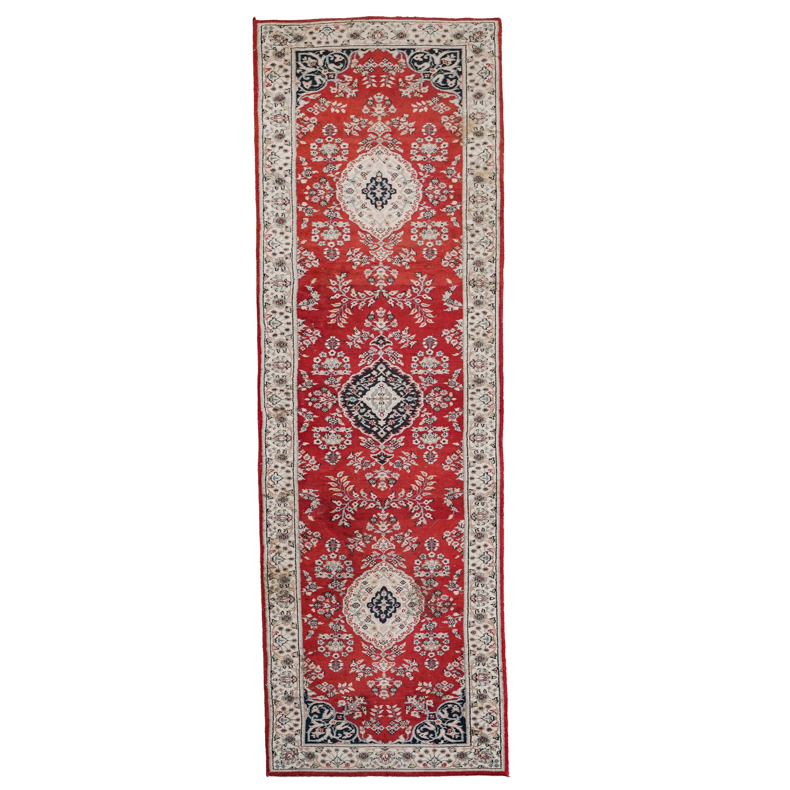 Persian Wool Runner Rug: Persian Wool Runner Rug 20th century A Persian wool runner rug featuring a traditional layout with a repeating sequence of cream-colored floral medallions down the center axis and intricate floral