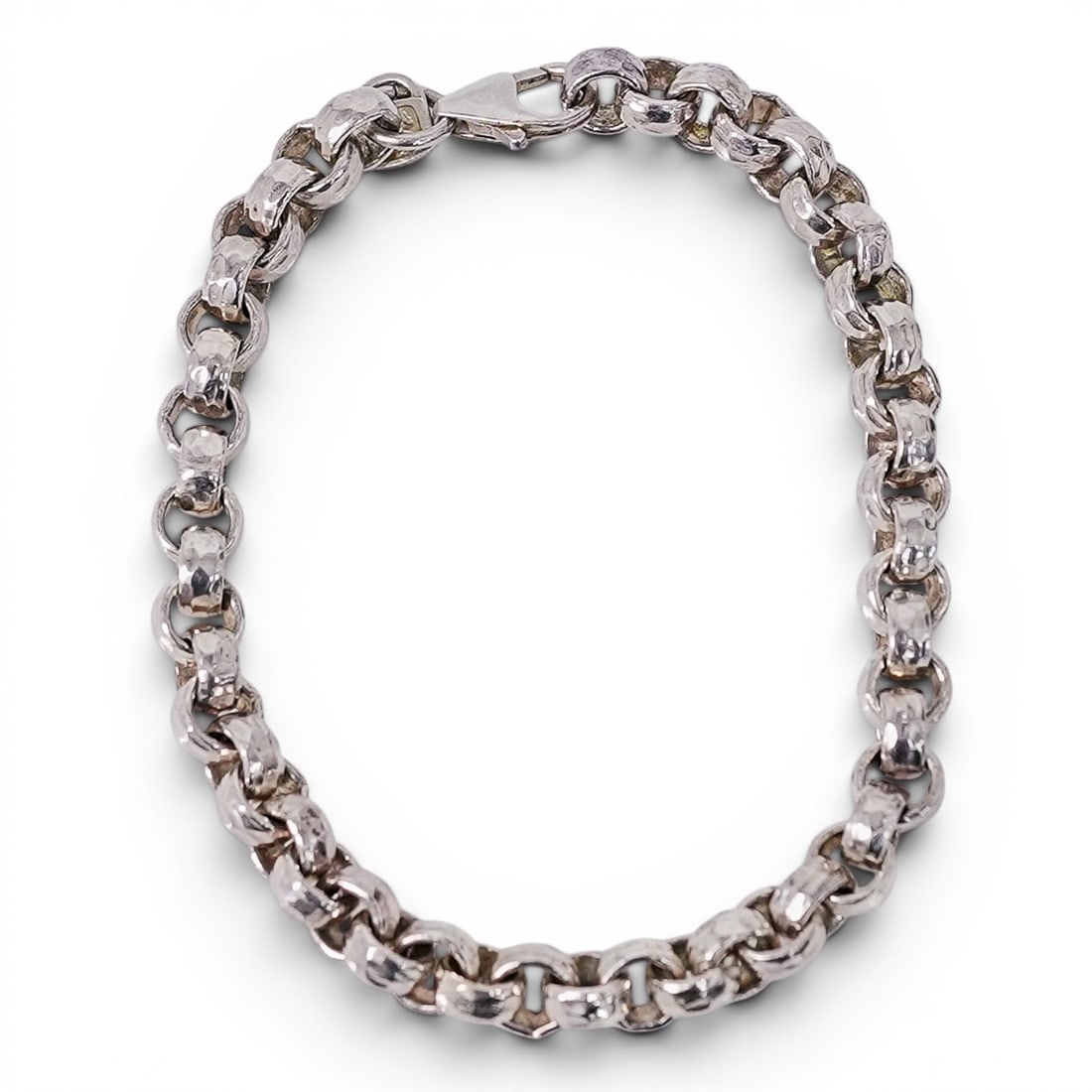 .999 Fine Silver Rolo Link Bracelet Signed: .999 Fine Silver Rolo Link Bracelet Signed 1990s, USA Heavy .999 fine silver rolo link bracelet with lobster clasp closure. Marked with lotus hallmark, ".999" and "USA". Constructed with substantial r