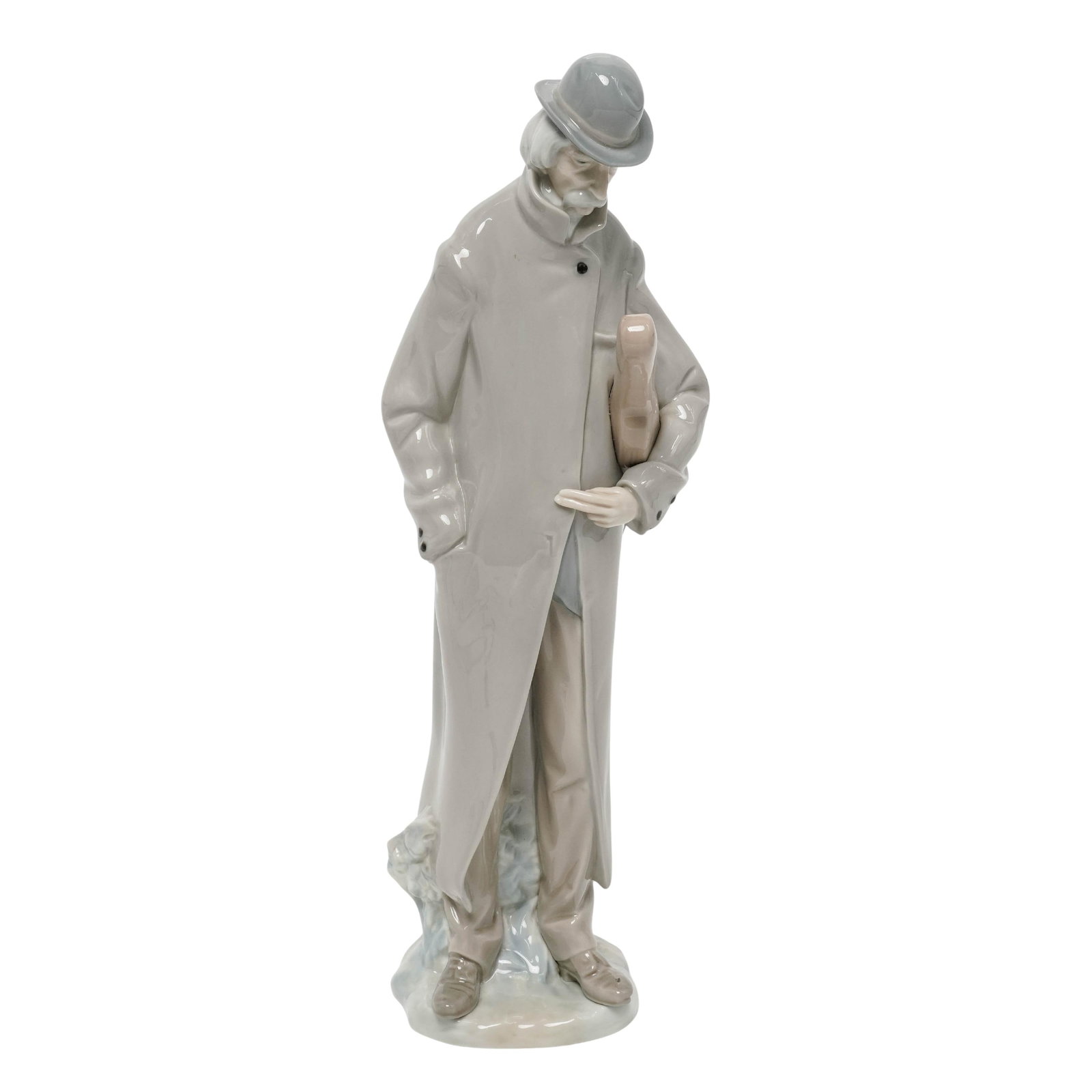 Lladro 'Old Man with Violin' Porcelain Figurine: Lladro 'Old Man with Violin' Porcelain Figurine Late 20th Century, Spain Spanish porcelain figurine depicting an elderly gentleman in a bowler hat and overcoat carrying a violin beneath his arm. Execu