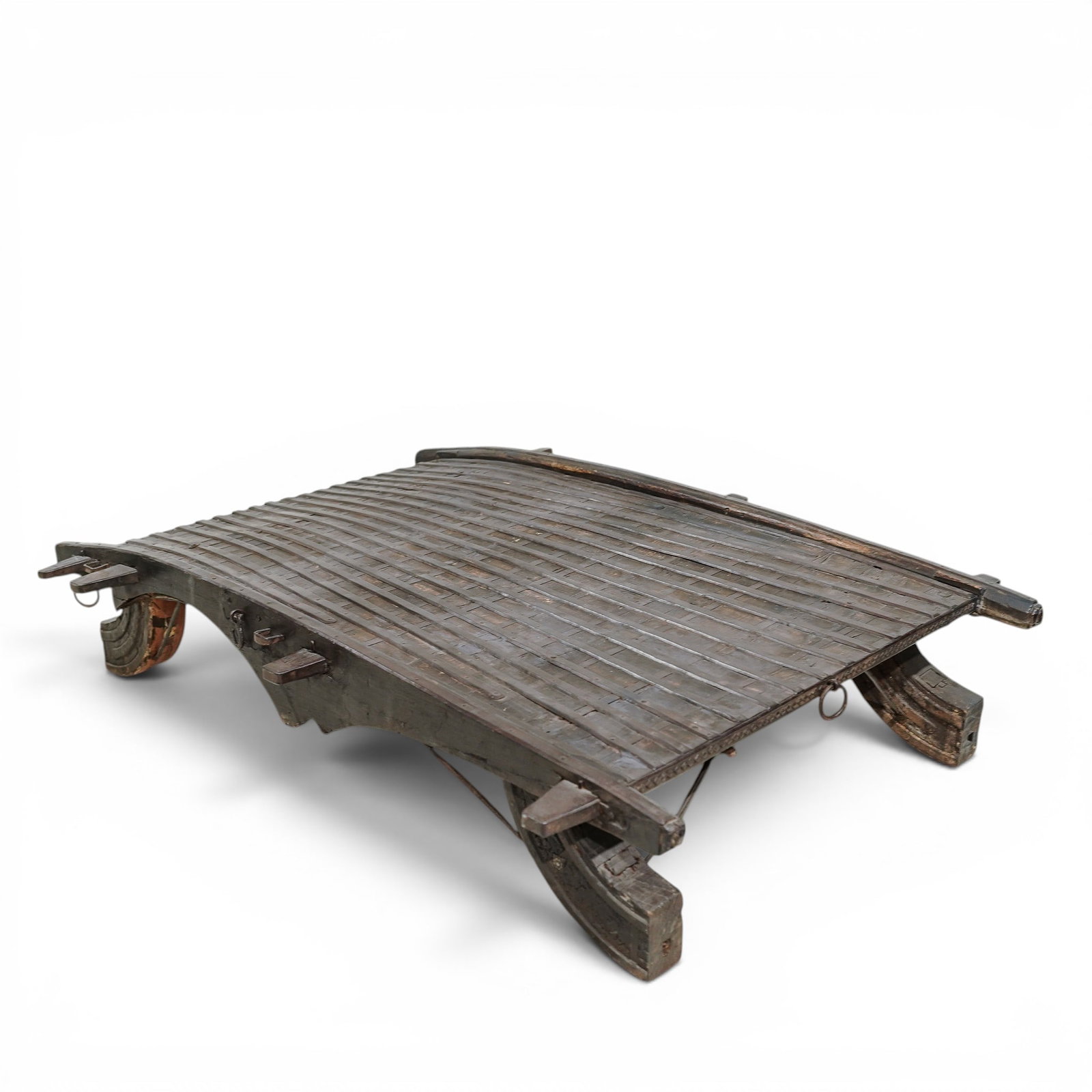 Antique Indian Brass & Iron Bullock Cart Table: Antique Indian Brass & Iron Bullock Cart Table Early 19th Century, India Antique Indian table fashioned from elements of a traditional bullock cart, featuring a slatted hardwood top supported by