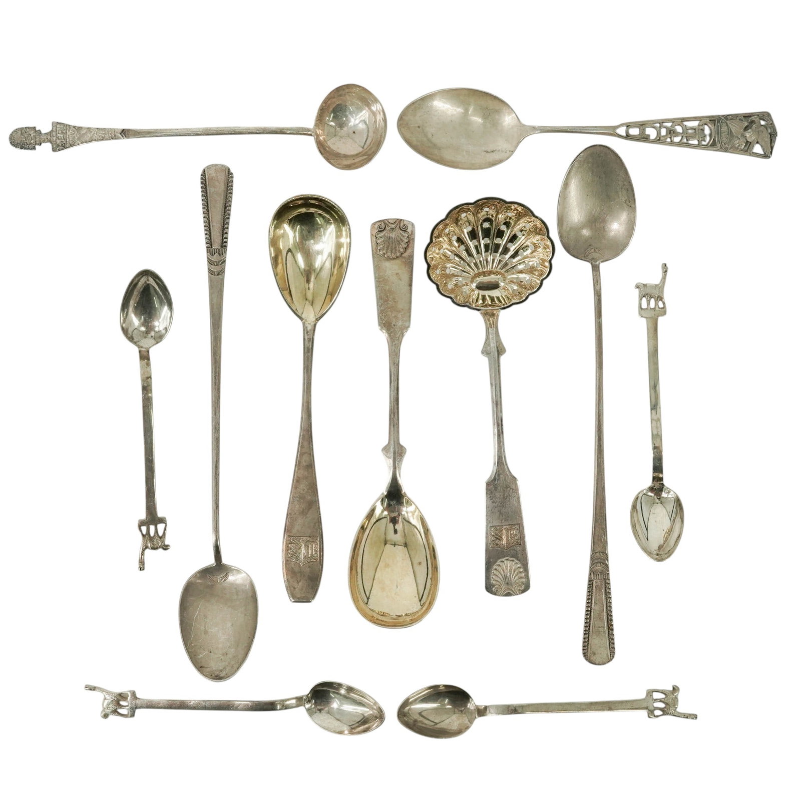Lot of Sterling Silver Vintage Spoons: Lot of Sterling Silver Vintage Spoons 20th century, USA, Peru, Finland Lot of include: (1) Chicago Illinois eagle spoon. Marked Sterling. (5) Small espresso figural spoons, marked 925. (1) Sterling
