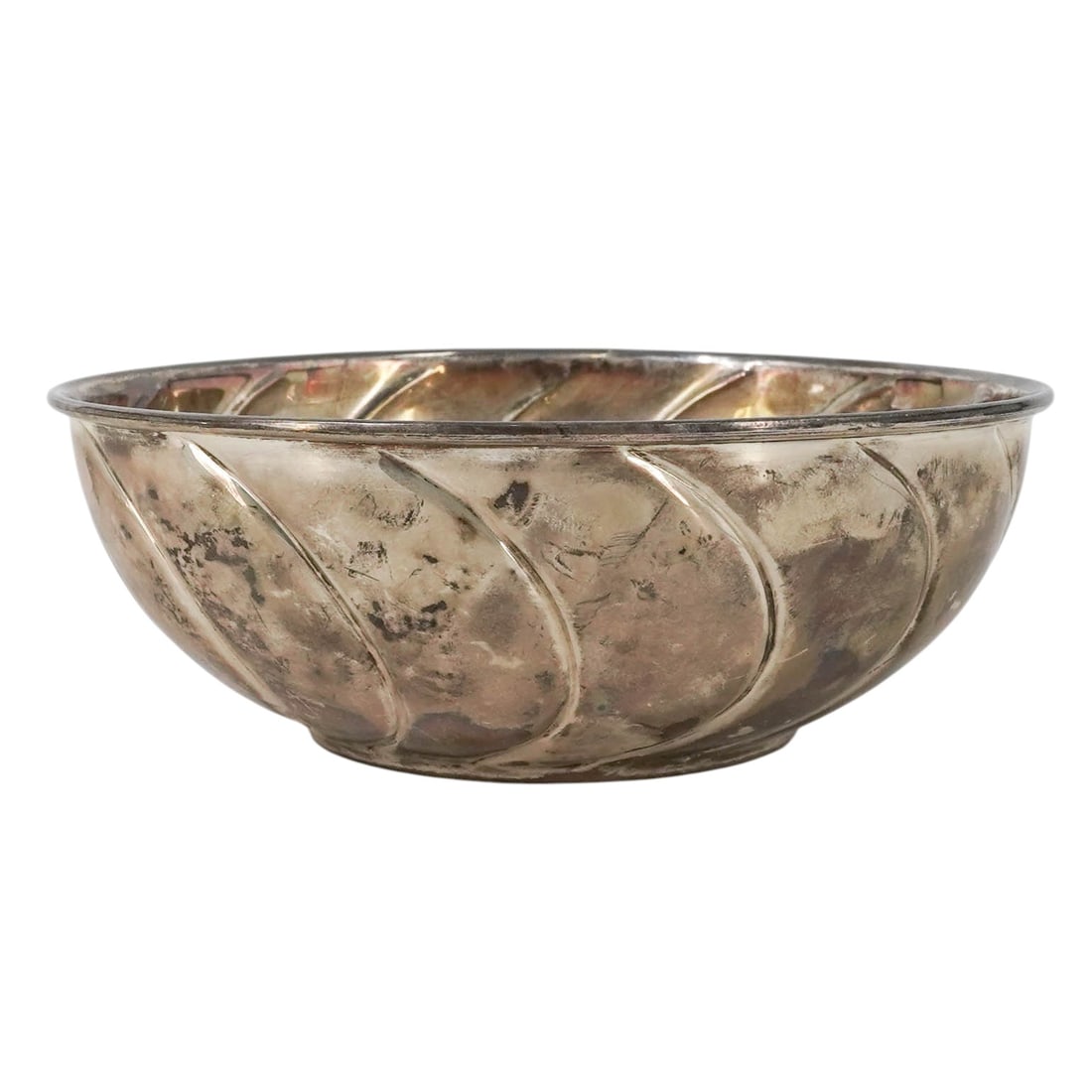Vintage Silver-Plated Ribbed Bowl: Vintage Silver-Plated Ribbed Bowl Mid-20th Century, Europe Decorative silver-plated serving or display bowl exhibiting a stylized swirl motif and reflective finish. Suitable as a centerpiece,