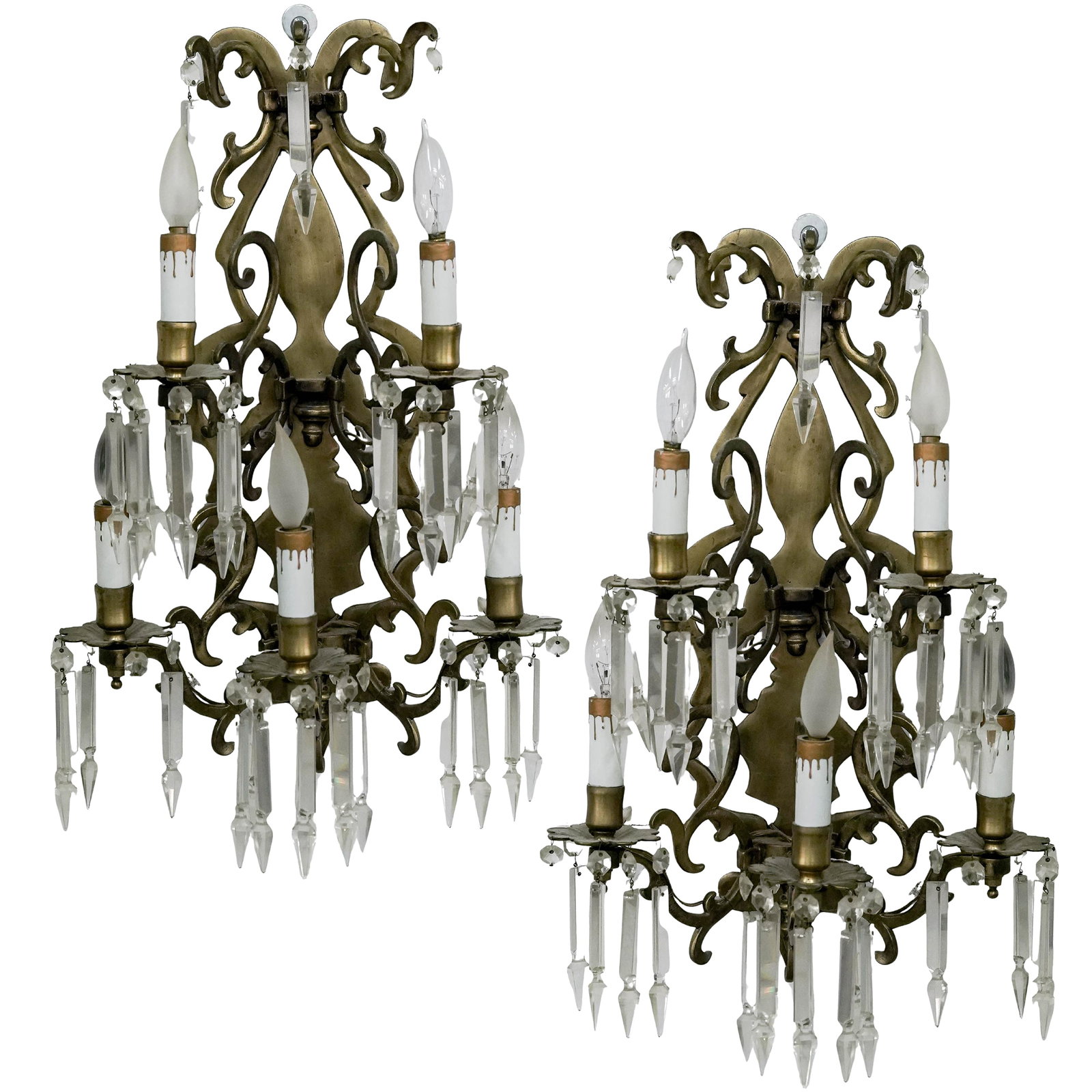 Pair Antique French Gilt Bronze and Crystal Sconces: Pair Antique French Gilt Bronze and Crystal Sconces 19th Cent, France air of antique French wall sconces crafted in gilt bronze with hanging crystal prisms and decorative scrolling arms. Converted for