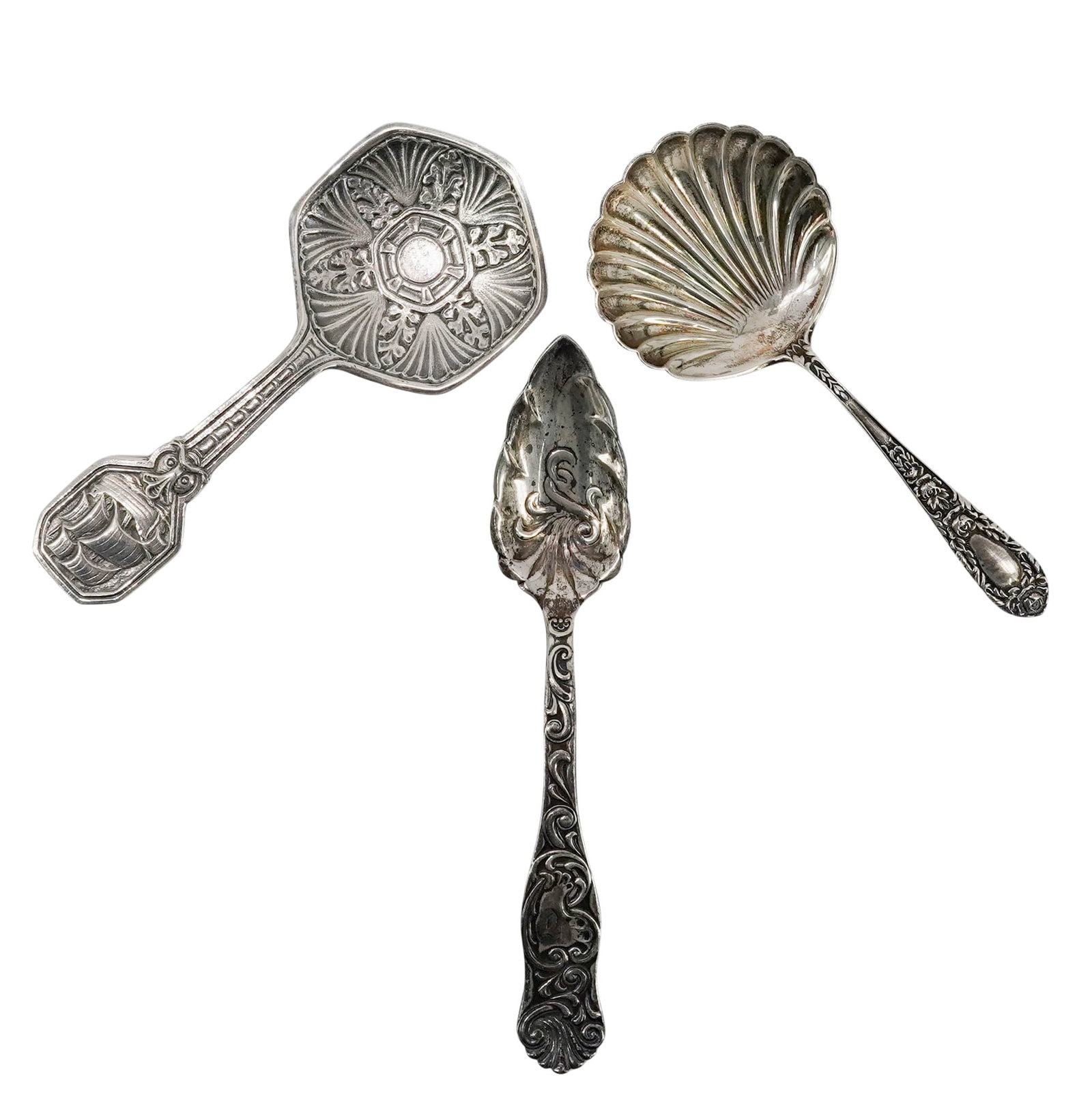 (3 pc) Tiffany & Co., S. Kirk & Son, Towle Sterling Silver Serving Spoons: (3 pc) Tiffany & Co., S. Kirk & Son, Towle Sterling Silver Serving Spoons Late 19th-early 20th centuries, USA The antique sterling spoons lot includes: (1) High weight Tiffany & Co Makers , Bon Bon Sp
