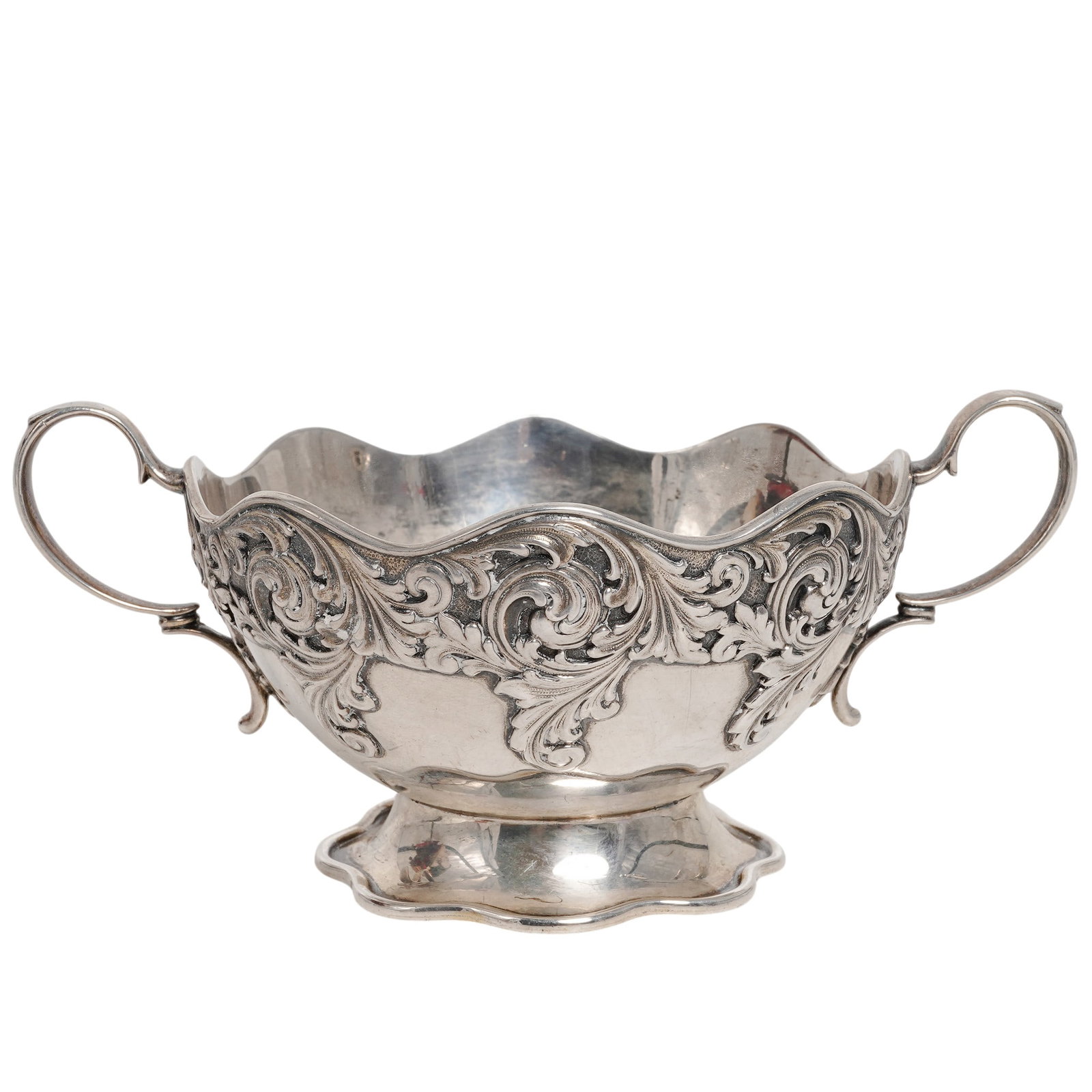Tiffany & Co Sterling Silver Sugar Bowl: Tiffany & Co Sterling Silver Sugar Bowl Mid - Late 20th Century, New York, USA Sterling silver sugar bowl by Tiffany & Co. with rounded body and slightly flared upper rim. Wave motif encircles the upp