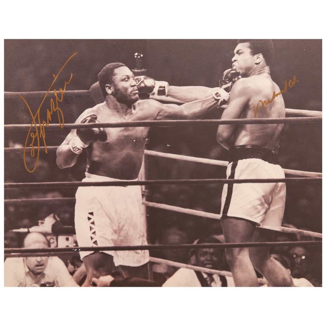 Signed Muhammad Ali and Joe Frazier Boxing Photo w/ JSA Letter: Signed Muhammad Ali and Joe Frazier Boxing Photo w/ JSA Letter c. 1971, USA Signed by both Muhammad Ali and Joe Frazier photo with JSA letter of authenticity. Certification Number: ZZ78776 . This was 