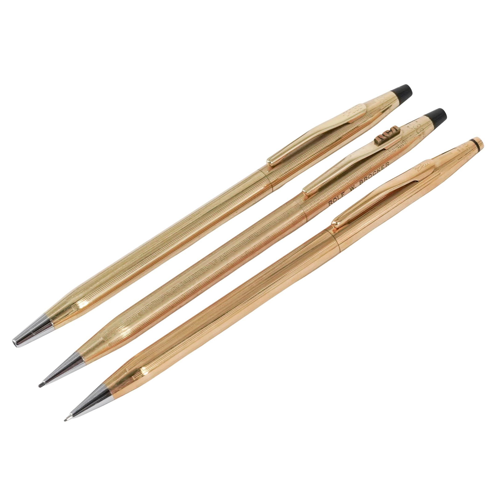 (3 pcs) Vintage Cross Gold Filled Pencils: (3 pcs) Vintage Cross Gold Filled Pencils 20th century A set of three vintage Cross gold filled pens. (1) Personalized reading "Robert W Brocker", marked near top "Cross made in USA" "1/20 12kt gold f