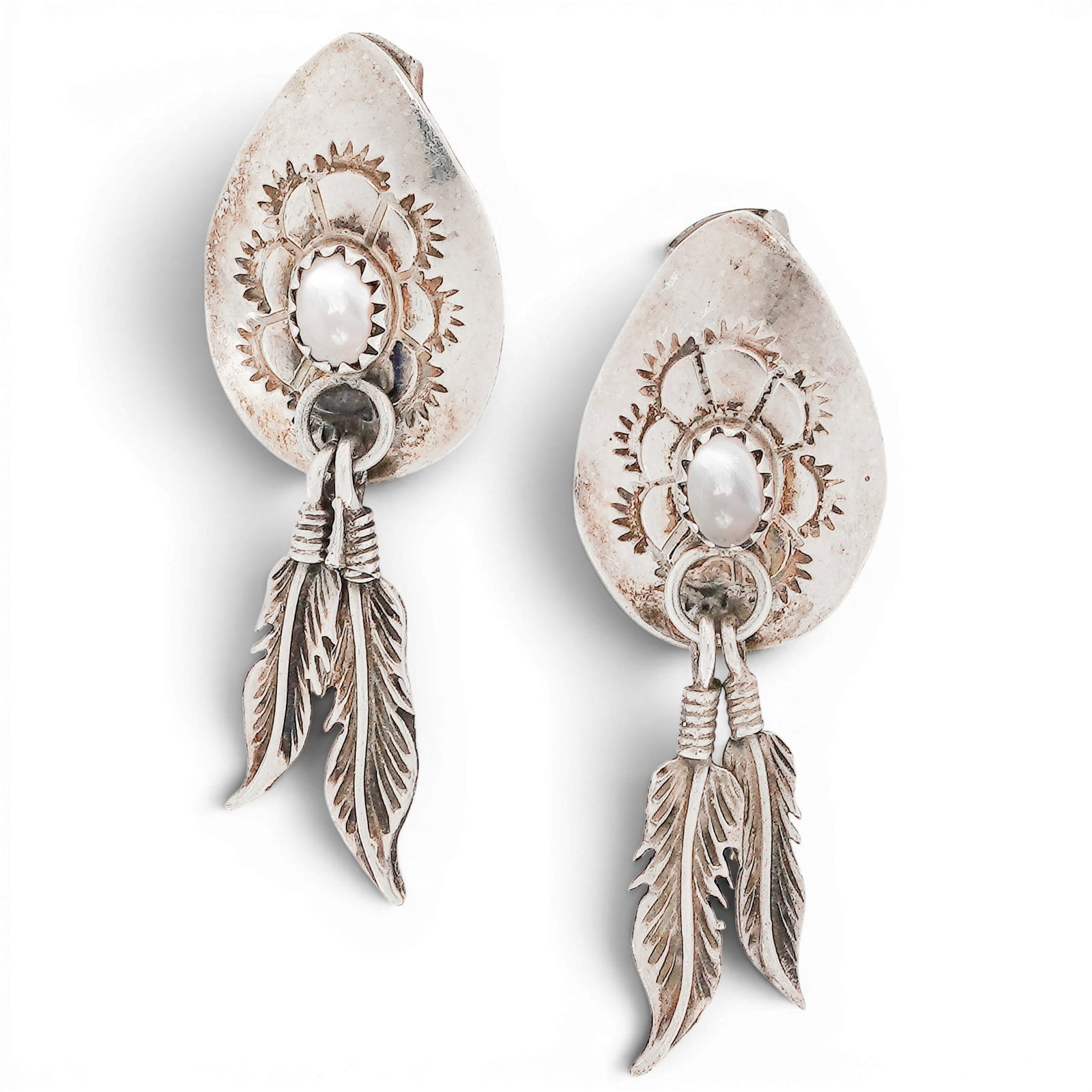 A pair of Southwest sterling silver, mother-of-pearl, and feather dangle earrings (1 of 3)