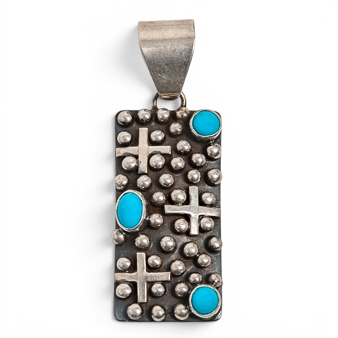 A Ronnie Willie sterling silver and turquoise tufa-cast pendant (1 of 5)