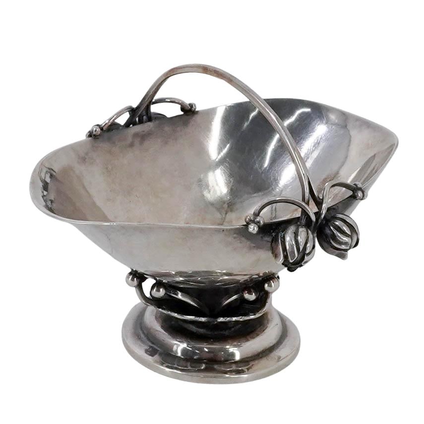 Georg Jensen "Blossom" Sterling Silver Spice Basket: Georg Jensen "Blossom" Sterling Silver Spice Basket Circa 1905-1917. Danish An antique Georg Jensen Danish sterling silver miniature footed basket in the iconic "Blossom" pattern featuring a classic