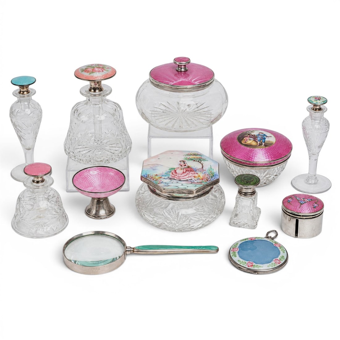 (12 pcs) Antique Sterling & Enameled Glass Dresser Set: (12 pcs) Antique Sterling & Enameled Glass Dresser Set Late 19th-early 20th century A set of twelve antique glass dresser items with sterling silver caps or stoppers and enameled details. (1) English 