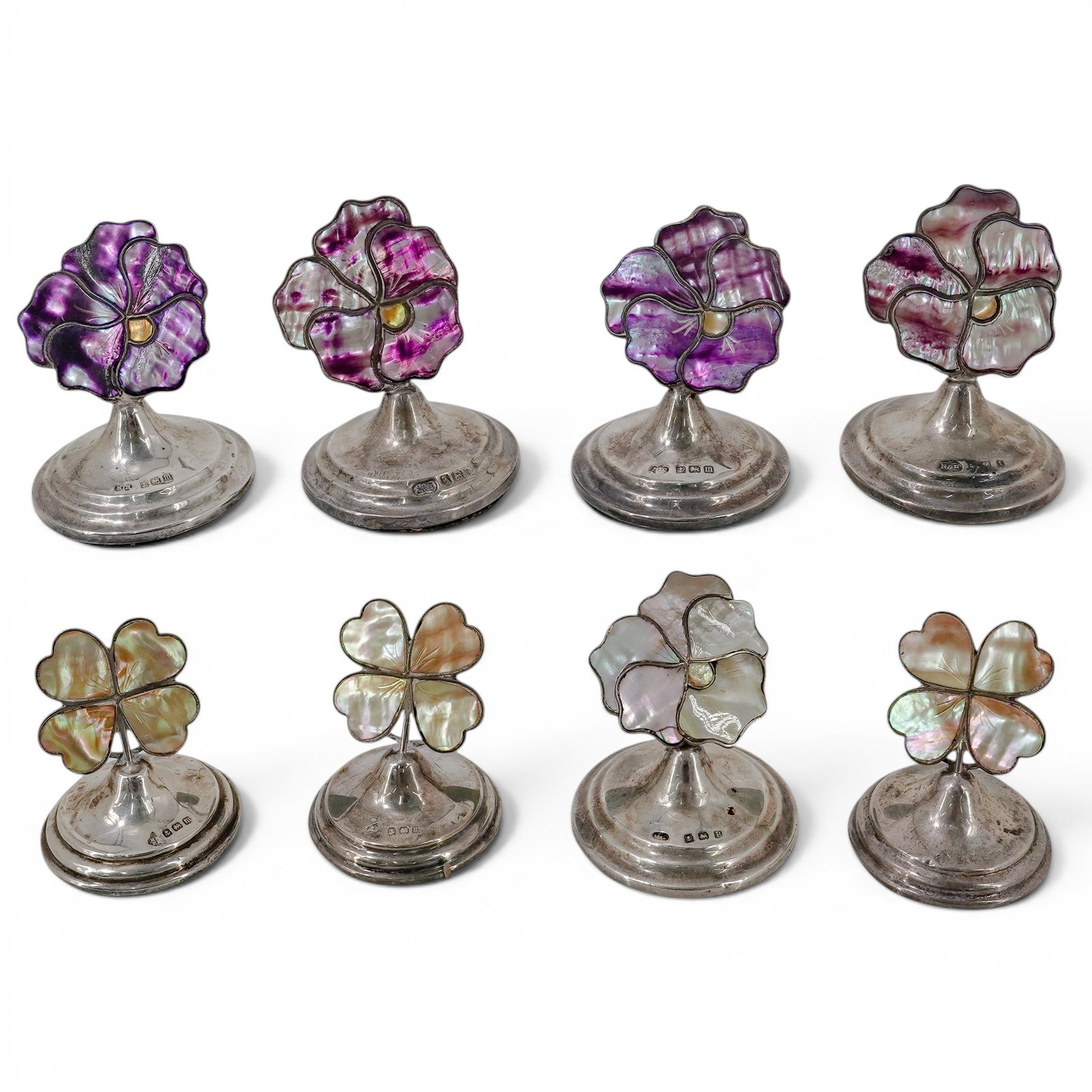 (8 pcs) English Sterling Silver & MOP Flower Place Card Holders: (8 pcs) English Sterling Silver & MOP Flower Place Card Holders 20th century, English A set of eight English sterling silver flower place card holders with mother-of-pearl accents in natural beige and
