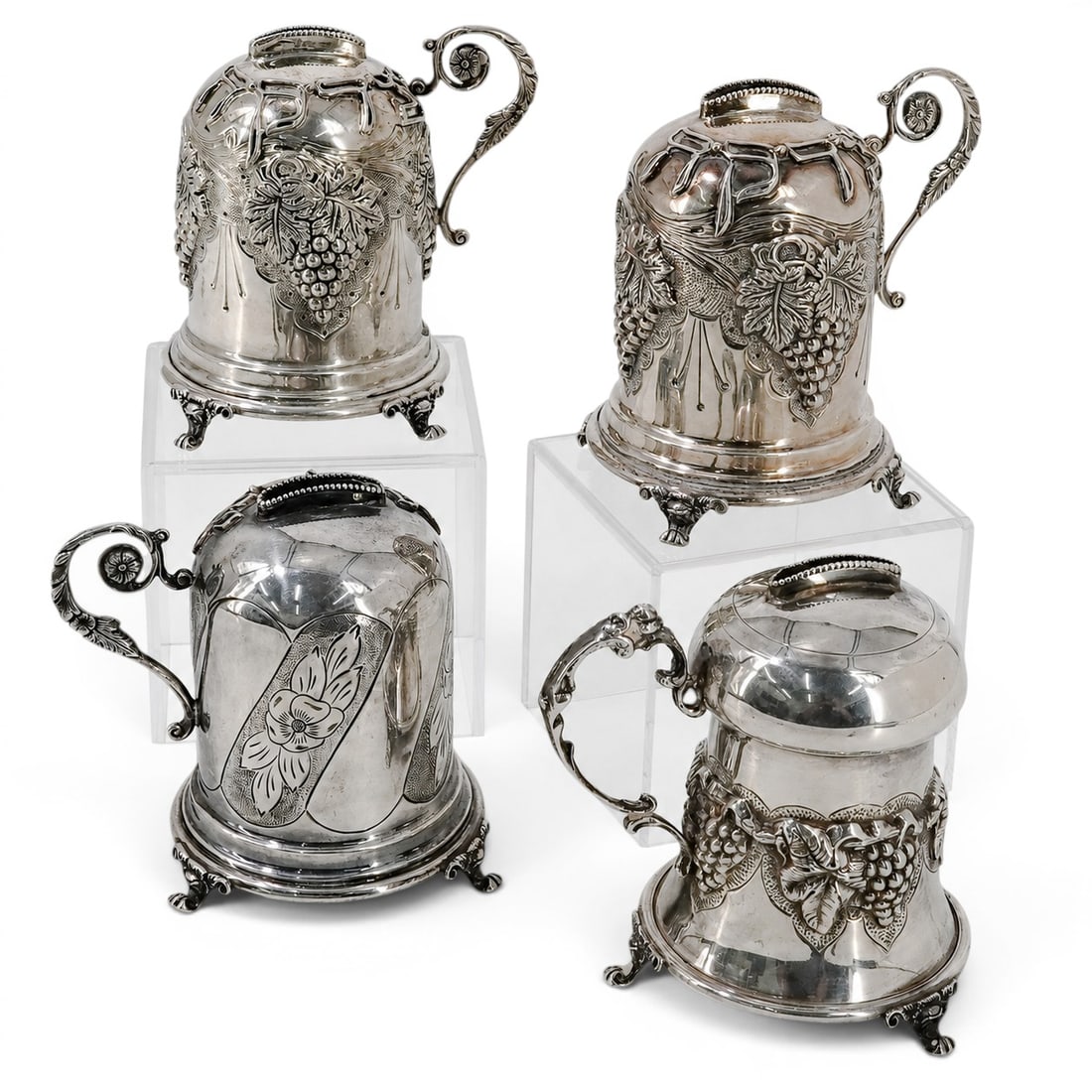 (4 pc) Hazorfim Sterling Silver Tzedakah Coin Banks: (4 pc) Hazorfim Sterling Silver Tzedakah Coin Banks 20th century, Israeli The most prominent feature of the banks is raised, stylized Hebrew lettering wrapped around the top shoulder of each dome. The