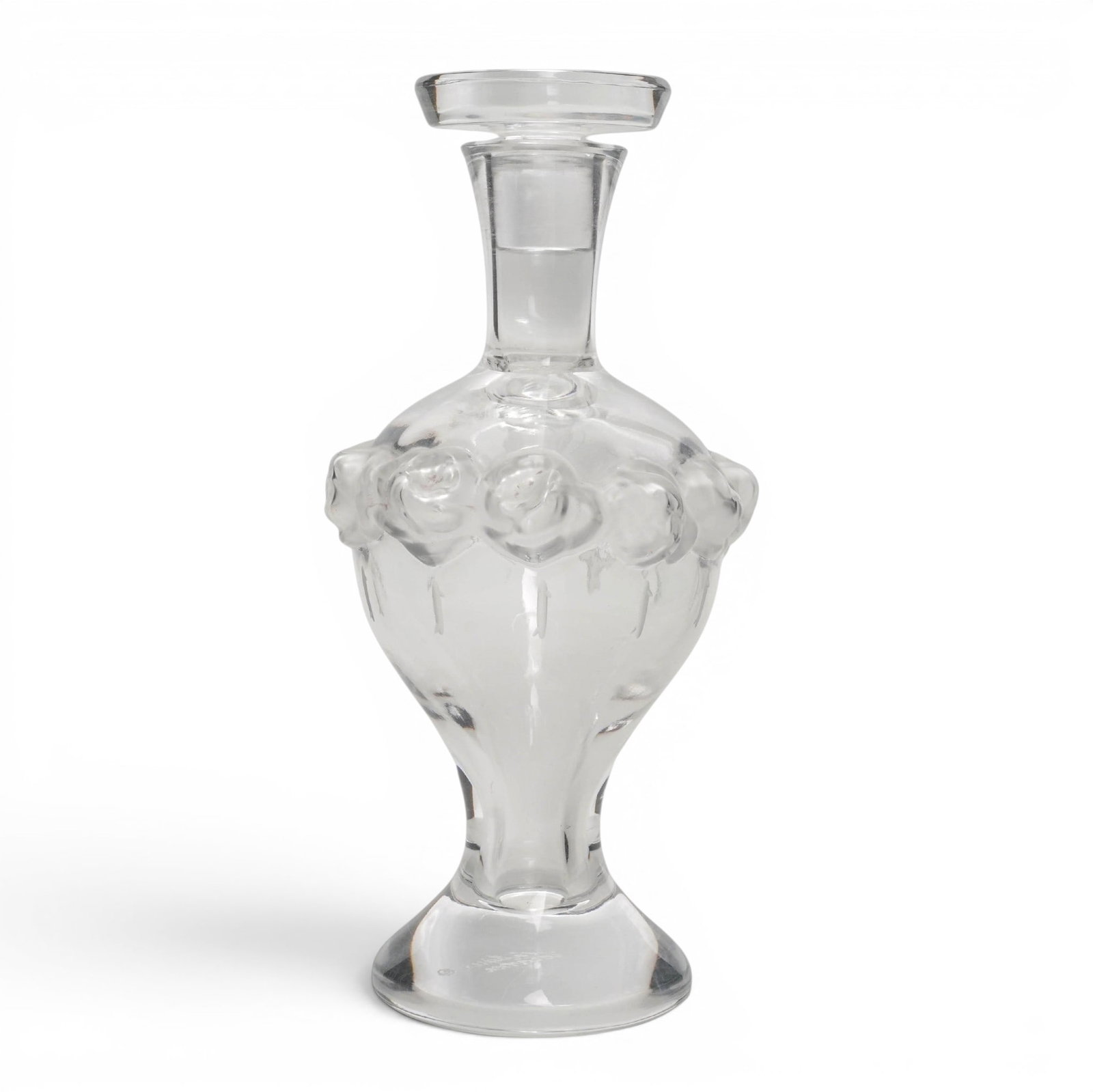 Lalique "Martine" Perfume Bottle: Lalique "Martine" Perfume Bottle 20th century, France The Lalique "Martine" perfume bottle is an iconic clear and frosted crystal flacon featuring a detailed garland of sculpted, molded roses encircli