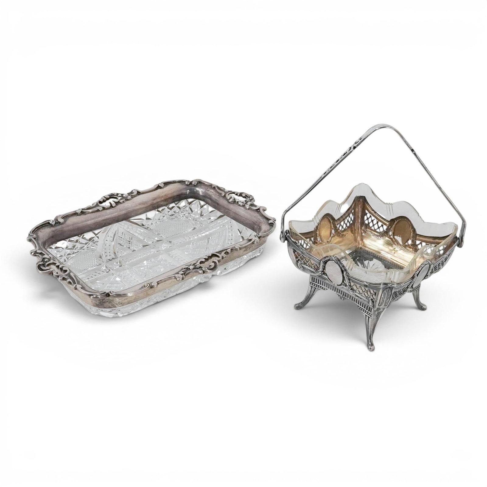 (2 pc) Stieff Co. Sterling Mounted Glass Dishes: (2 pc) Stieff Co. Sterling Mounted Glass Dishes 20th century, USA The lot of two includes: (1) The Stieff sterling silver rim frames the perimeter securely. The pattern showcases classic American