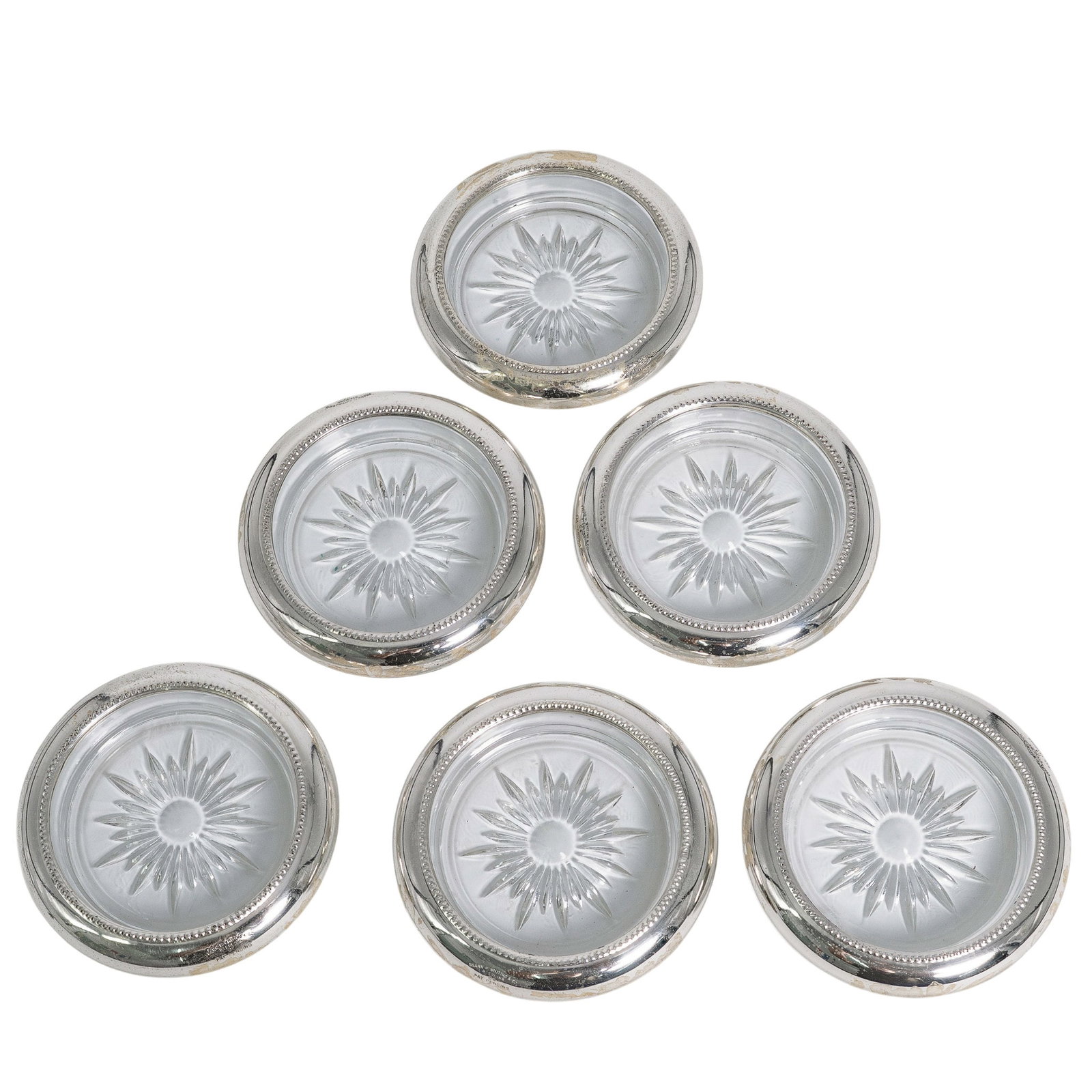 (6 pcs) Frank M Whiting & Co. Sterling Mounted Glass Coasters: (6 pcs) Frank M Whiting & Co. Sterling Mounted Glass Coasters Late 19th-early 20th century, American A set of six Frank M Whiting & Co. (American, late 19th-early 20th century) sterling silver