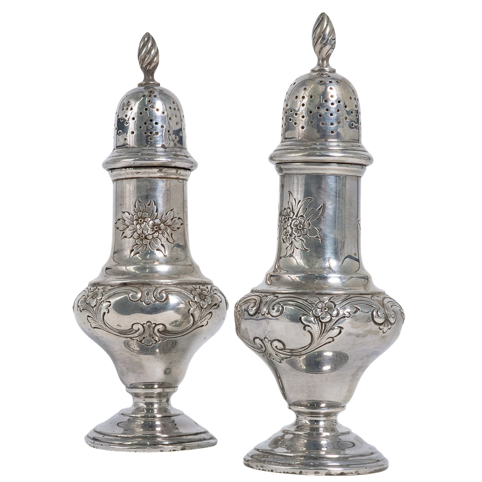 Pair of Shreve & Co Sterling Salt and Pepper Shakers: Pair of Shreve & Co Sterling Salt and Pepper Shakers Early 20th century, American A pairing of sterling silver salt and pepper shakers by Shreve & Co. (American, est. 1852). Marked on bottom "Shreve