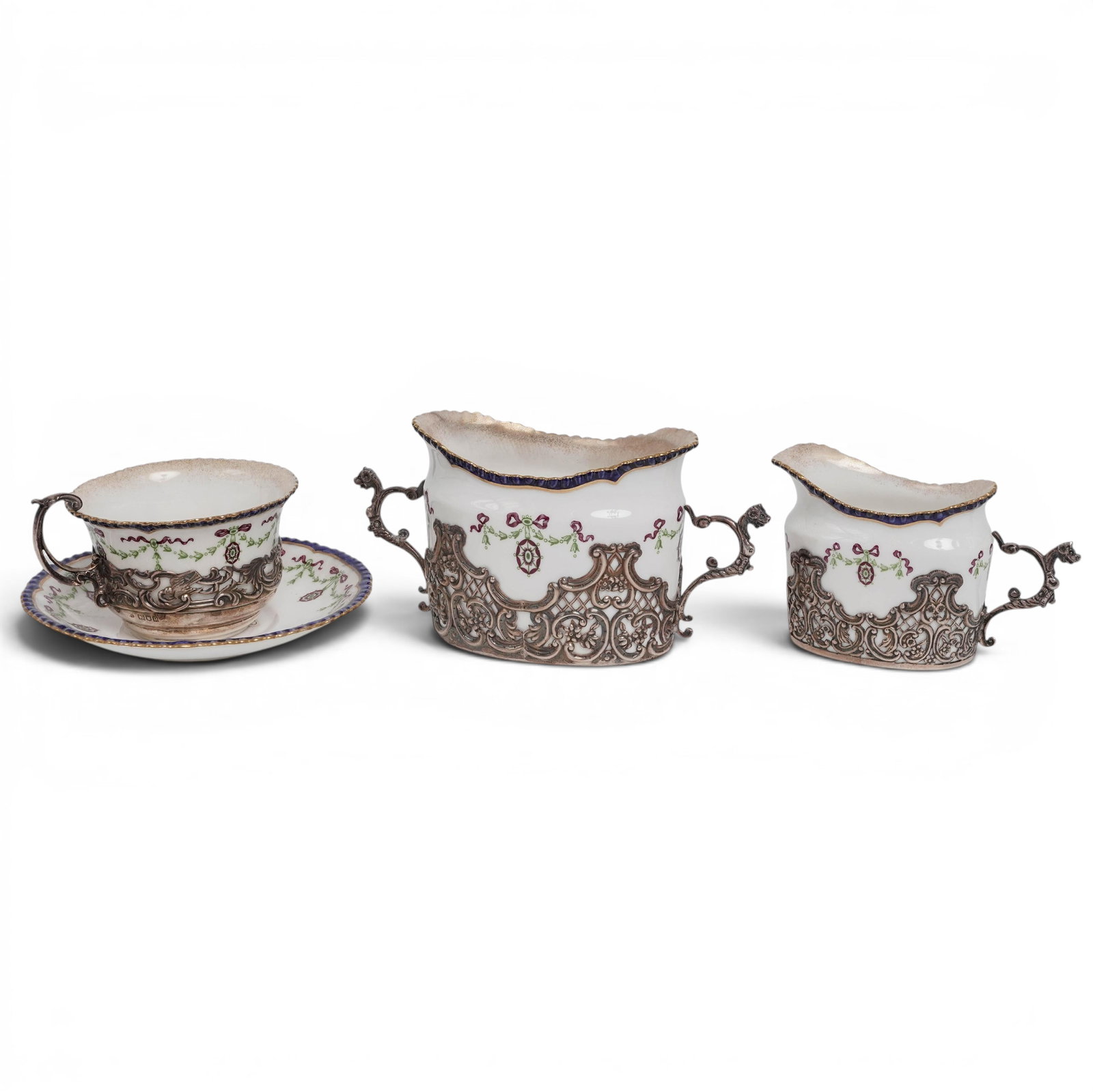 (4 pc) Royal Worcester Sterling Silver Mounted Porcelain Tea Set: (4 pc) Royal Worcester Sterling Silver Mounted Porcelain Tea Set c. 1914, England A matching Edwardian-era Royal Worcester luxury open sugar bowl, creamer- pitcher, and demitasse cup with matching sau