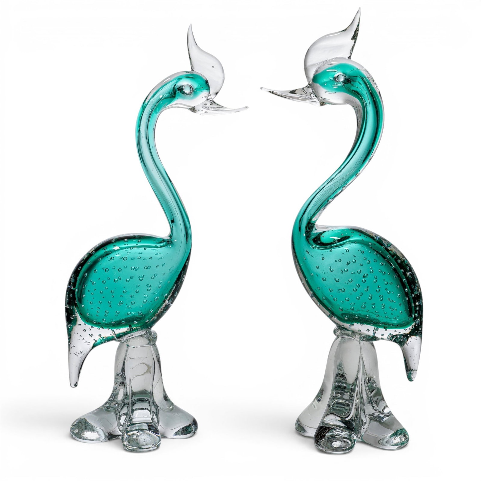 Pair Murano Sommerso Glass Bird Sculptures: Pair Murano Sommerso Glass Bird Sculptures 20th century, Italy Vintage Murano art glass sculptures, likely depicting swans or exotic birds, featuring a vibrant green body and a clear, sculptural