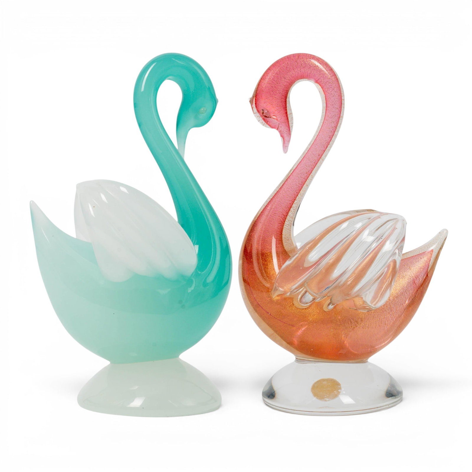 Pair Archimede Seguso Murano Glass Swan Sculptures: Pair Archimede Seguso Murano Glass Swan Sculptures c. 1950s. Italian Vintage Murano glass swan sculptures designed by Archimede Seguso in the 1950s. The green swan is crafted from alabastro glass, a
