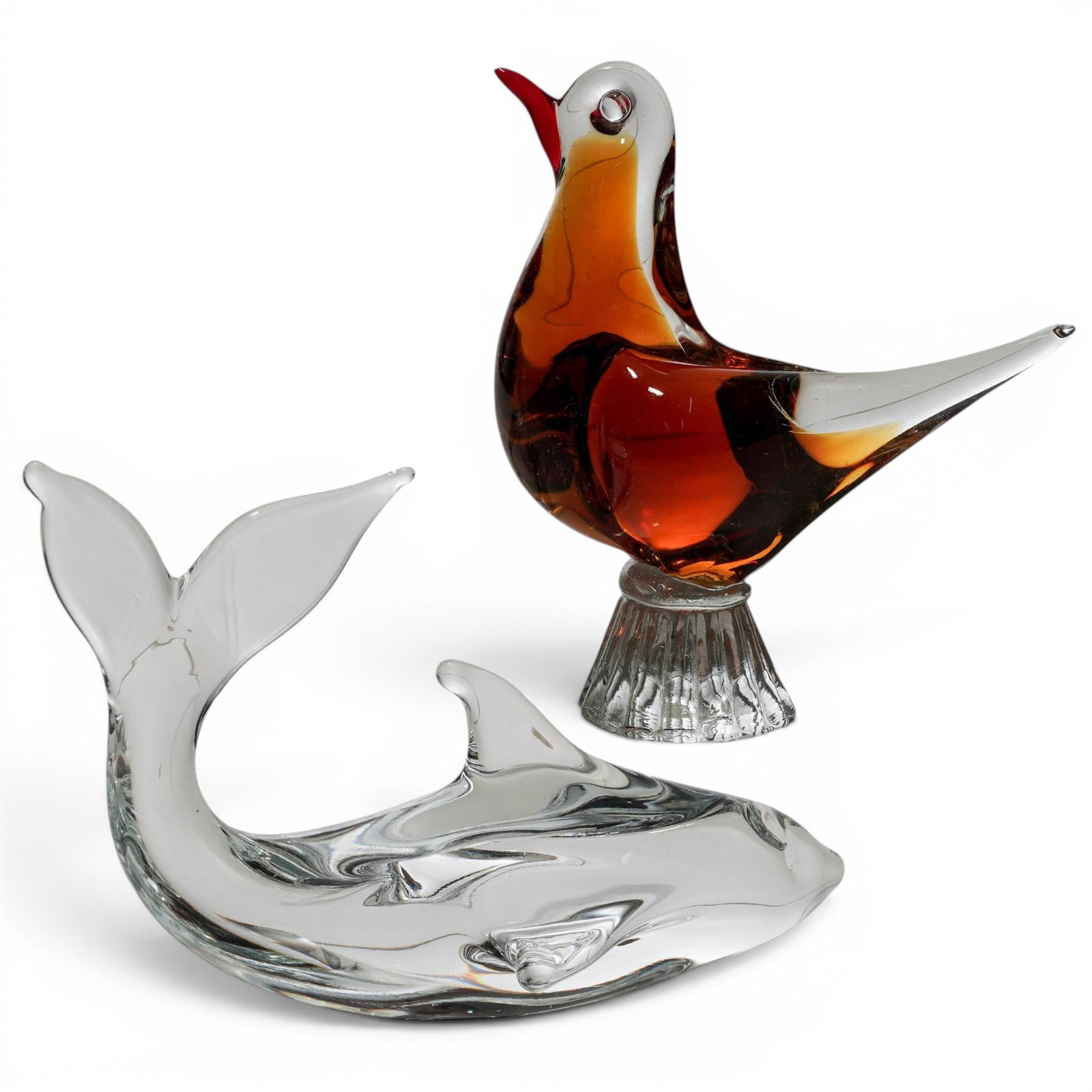 (2pc) Murano Glass Rooster & Dolphin Figurines: (2pc) Murano Glass Rooster & Dolphin Figurines 20th Cent., Italian The lot includes: (1) A Sommerso amber and red rooster figurine featuring a rich amber-brown body encased in a thick clear layer, acc