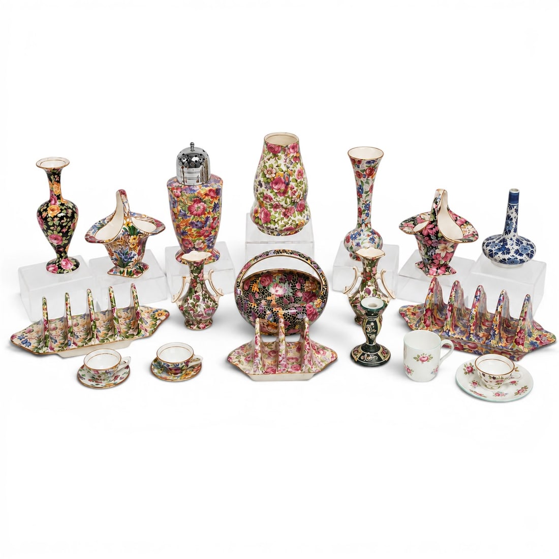 (20 pc) Grouping of Floral English Porcelain Tableware: (20 pc) Grouping of Floral English Porcelain Tableware 20th Century, Europe Charming collection of English floral and chintz-pattern porcelain tableware and decorative accessories, featuring examples 