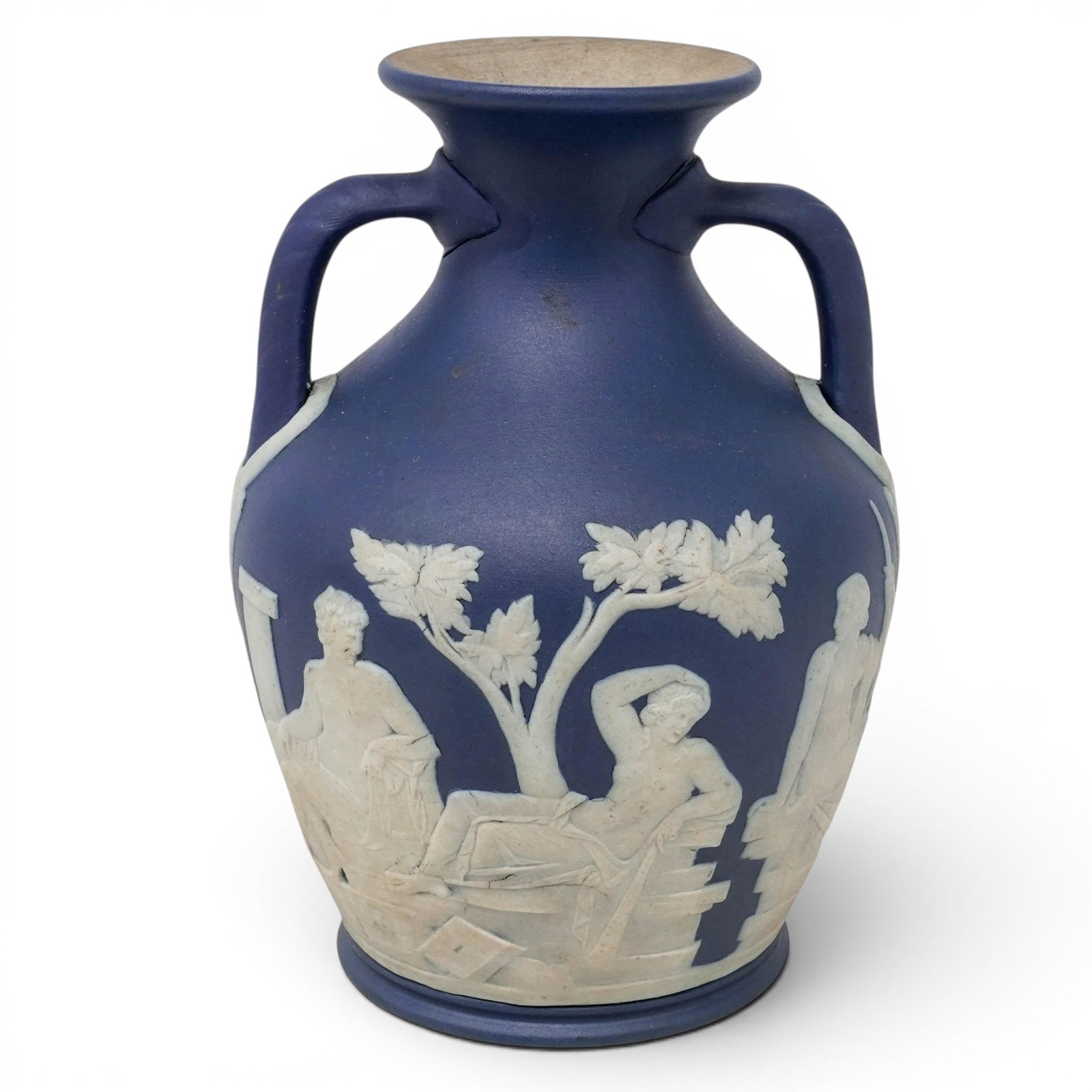 Wedgwood Portland Blue Jasperware Vase: Wedgwood Portland Blue Jasperware Vase 20th century, English Miniature Wedgwood Portland blue jasperware vase with Neoclassical reliefs in white. Stamped on bottom "Wedgwood England J Y". H 5" x W