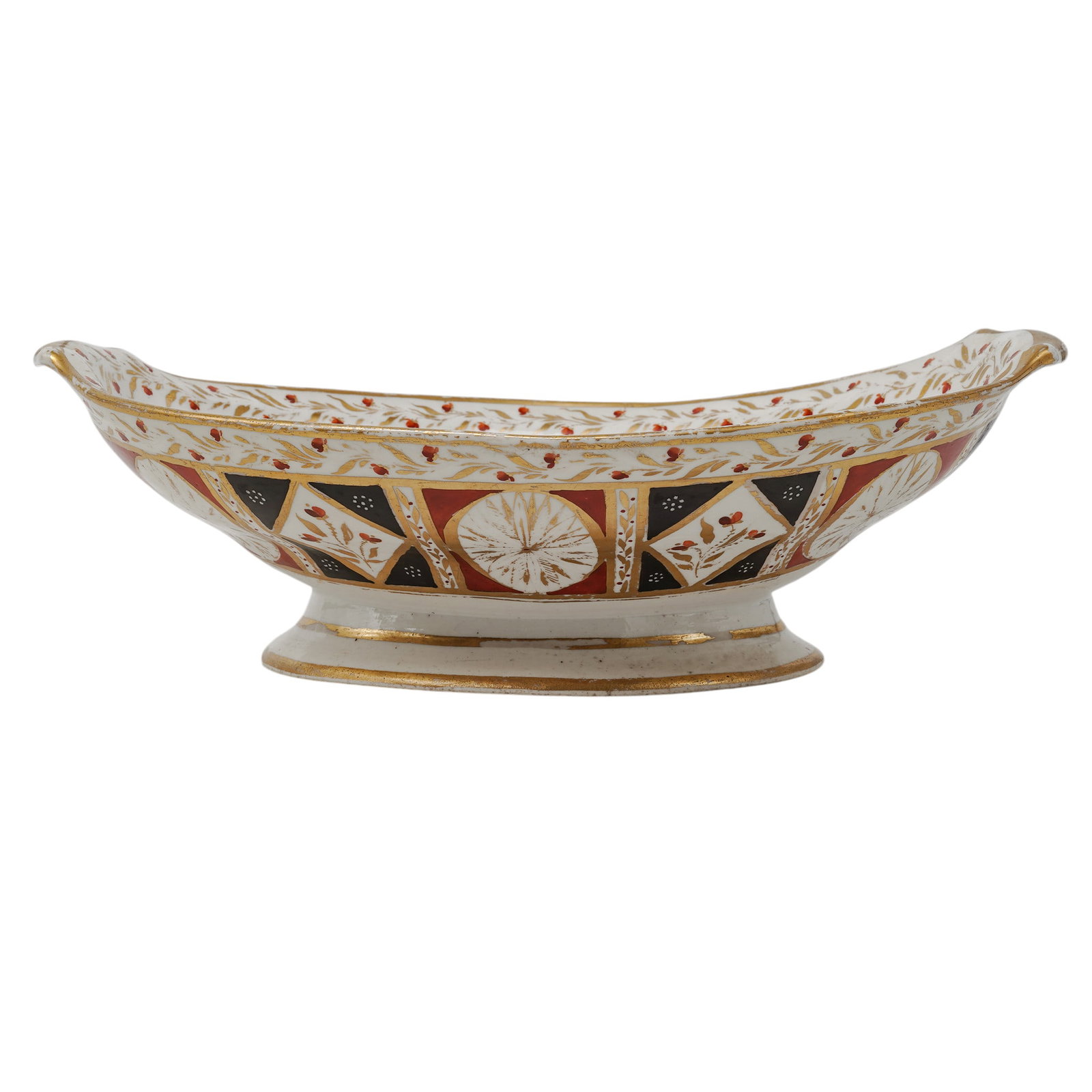 Antique English Porcelain Footed Serving Bowl: Antique English Porcelain Footed Serving Bowl Early 20th Cent. English The piece features the iconic Traditional Imari pattern. The surface is decorated with geometric panels, diamond fields, and