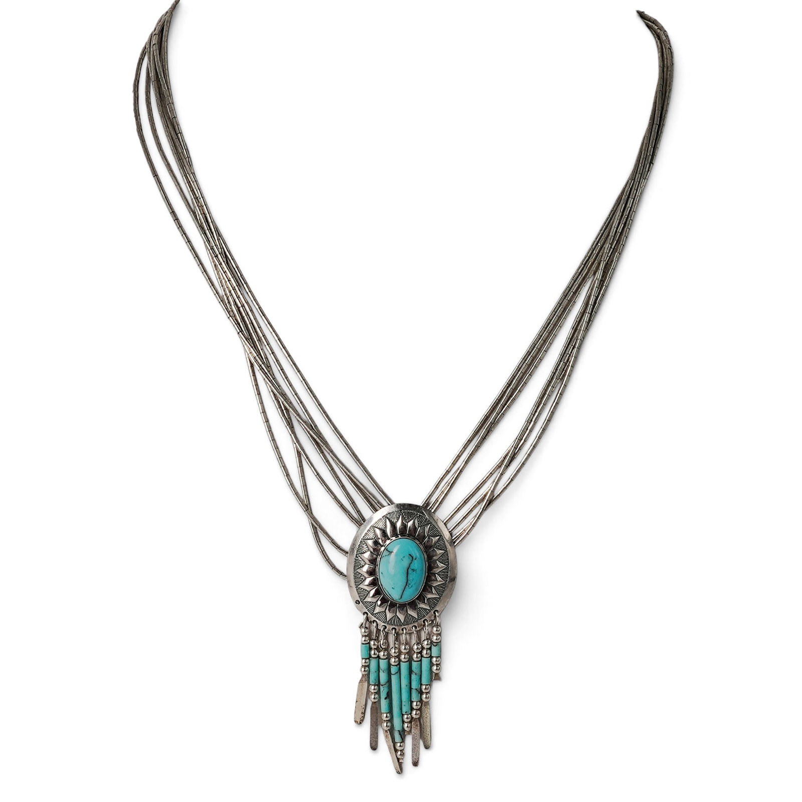 A Navajo Sterling Silver And Turquoise Liquid Silver Concho Fringe Necklace: A Navajo Sterling Silver And Turquoise Liquid Silver Concho Fringe Necklace Late 20th century Stamped: Sterling. A multi-strand liquid silver necklace centered by an oval concho-form turquoise cluster