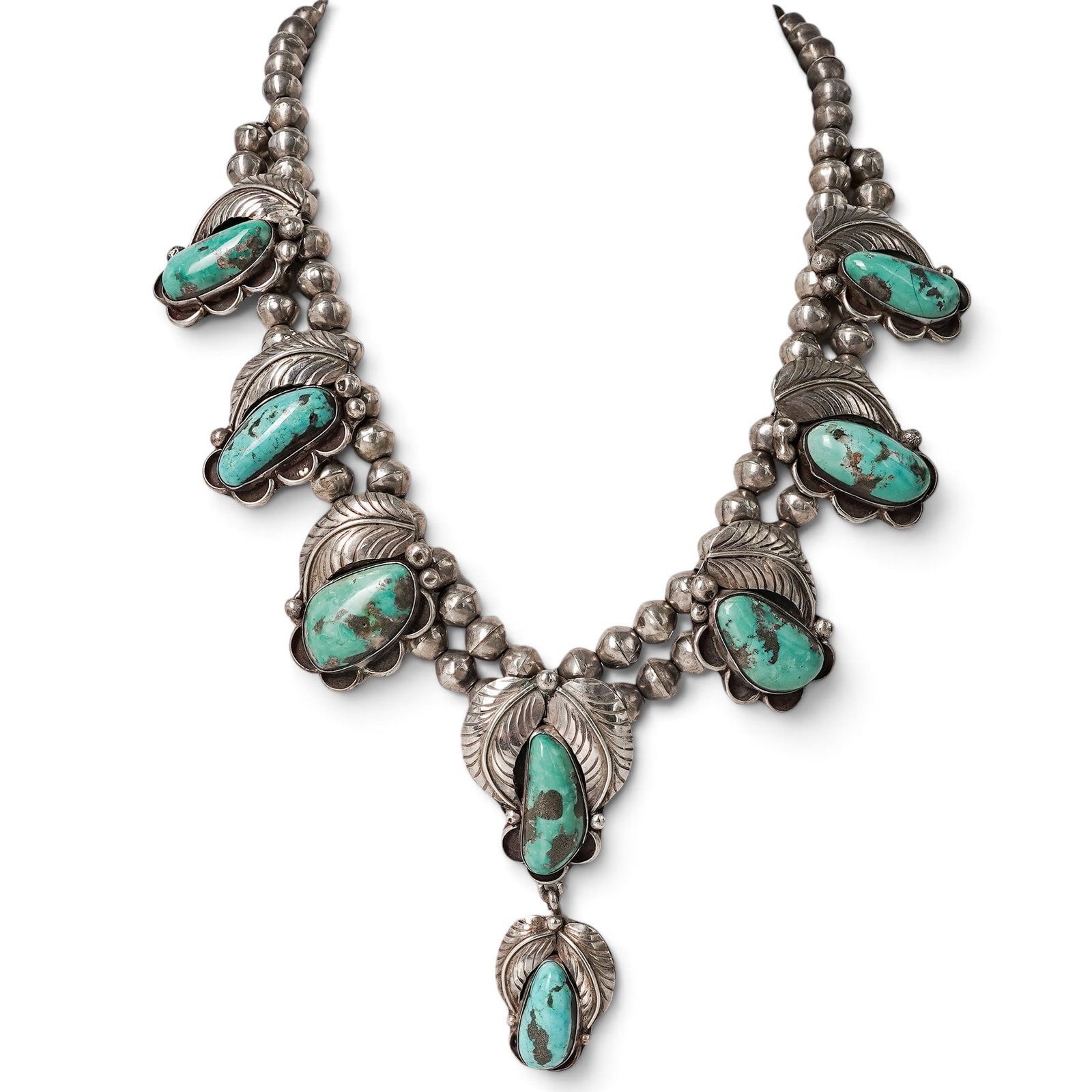 A Navajo Sterling Silver And Turquoise Leaf Motif Squash Blossom Necklace (1 of 6)