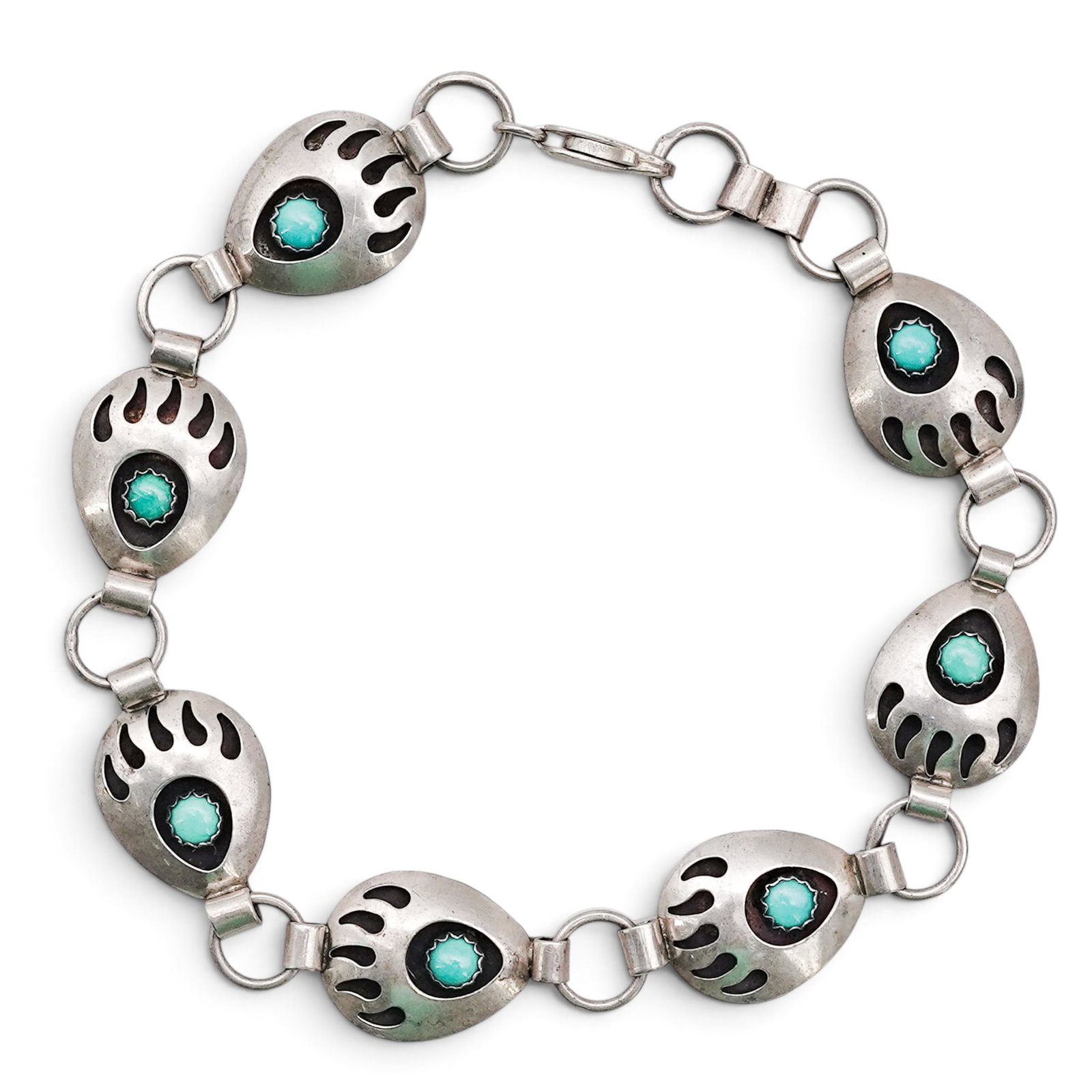 A Lester Ortiz Navajo Sterling Silver And Turquoise Bear Paw Link Bracelet (1 of 6)