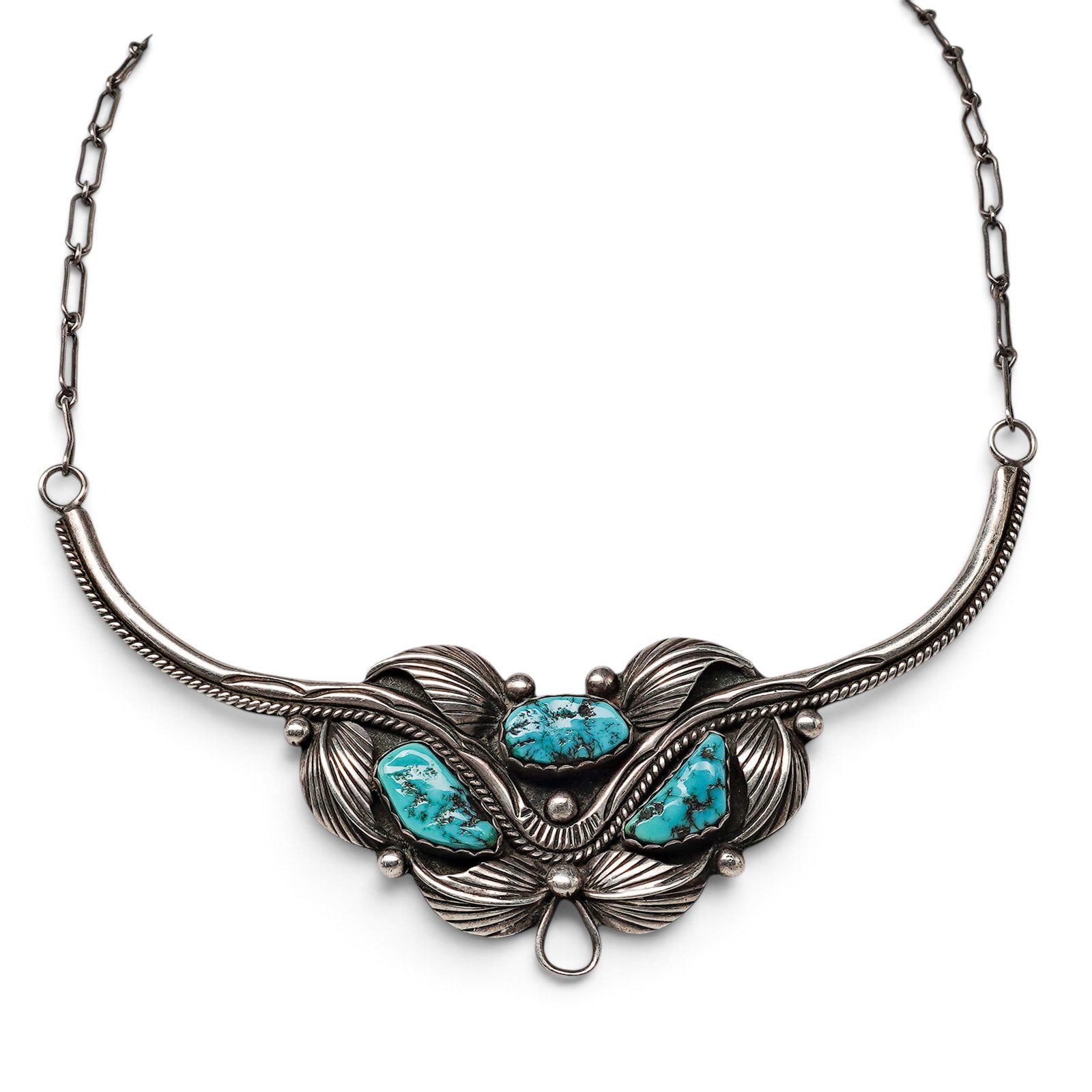 A Signed Navajo Sterling Silver And Turquoise Floral Collar Necklace: A Signed Navajo Sterling Silver And Turquoise Floral Collar Necklace Mid/late 20th century Stamped: BM, unidentified maker Tests for sterling. A handmade paperclip-link necklace suspending a curved si