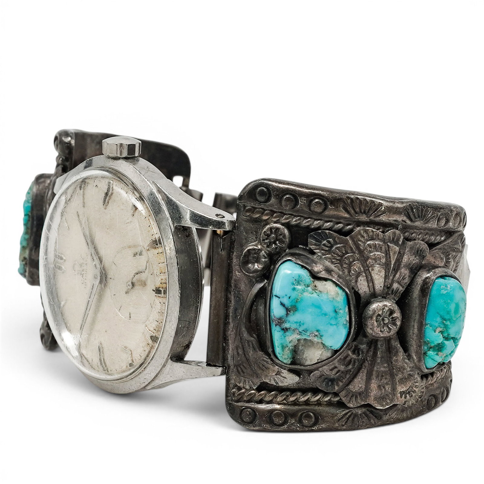An Omega Automatic Wristwatch With Navajo Sterling Silver And Turquoise Cuff Watch Band: An Omega Automatic Wristwatch With Navajo Sterling Silver And Turquoise Cuff Watch Band Mid-20th Century Omega Watch Co. Stamped: Watch case signed Omega; Unidentified Navajo maker's mark on band. A s