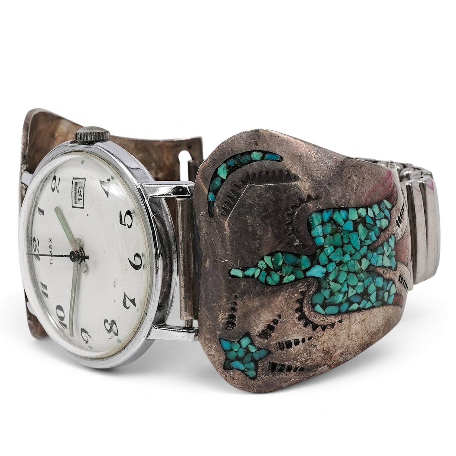 A Timex Wristwatch With Navajo Sterling Silver And Turquoise Chip Inlay Cuff Watch Band: A Timex Wristwatch With Navajo Sterling Silver And Turquoise Chip Inlay Cuff Watch Band Late 20th century Unmarked watch band; dial signed: Timex. Tested sterling silver. A cuff style watch band with 