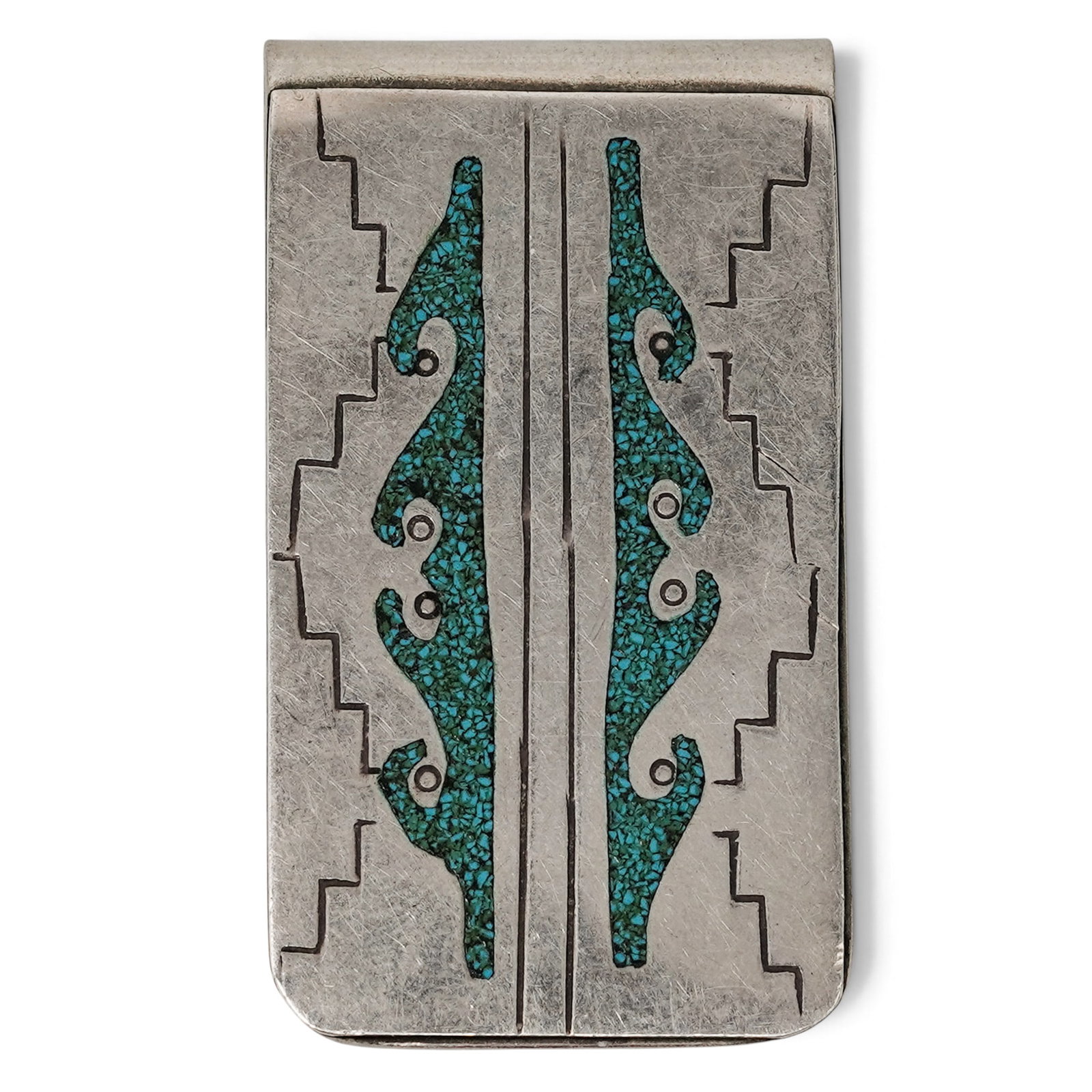 An Elaine Becenti Navajo Sterling Silver And Turquoise Inlay Money Clip: An Elaine Becenti Navajo Sterling Silver And Turquoise Inlay Money Clip Late 20th Century Stamped: B / Sterling. A rectangular silver money clip with turquoise inlay scroll motifs and geometric steppe