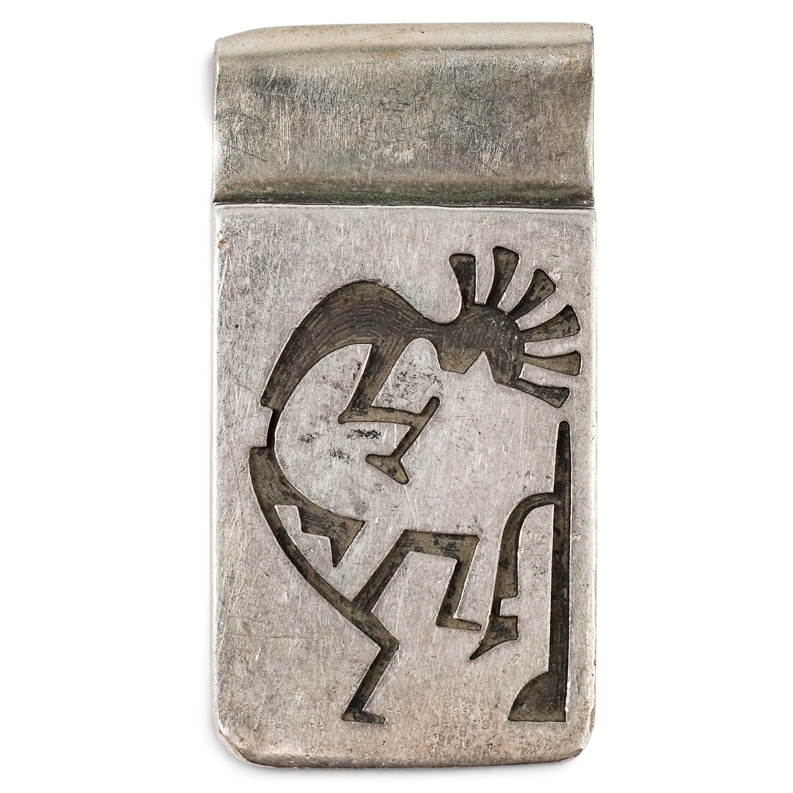A George Phillips Hopi Sterling Silver Kokopelli Money Clip: A George Phillips Hopi Sterling Silver Kokopelli Money Clip Late 20th century Stamped: G.P. / Pictorial hallmark. Tested sterling silver. A rectangular silver money clip with an overlay Kokopelli figu